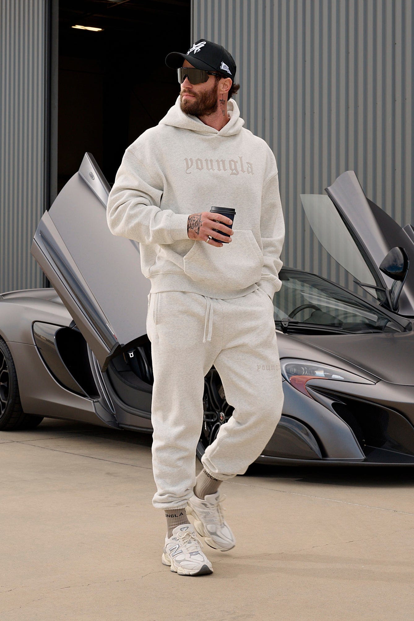 Side angle of mens UA Rival fleece joggers perfect for casual outings.