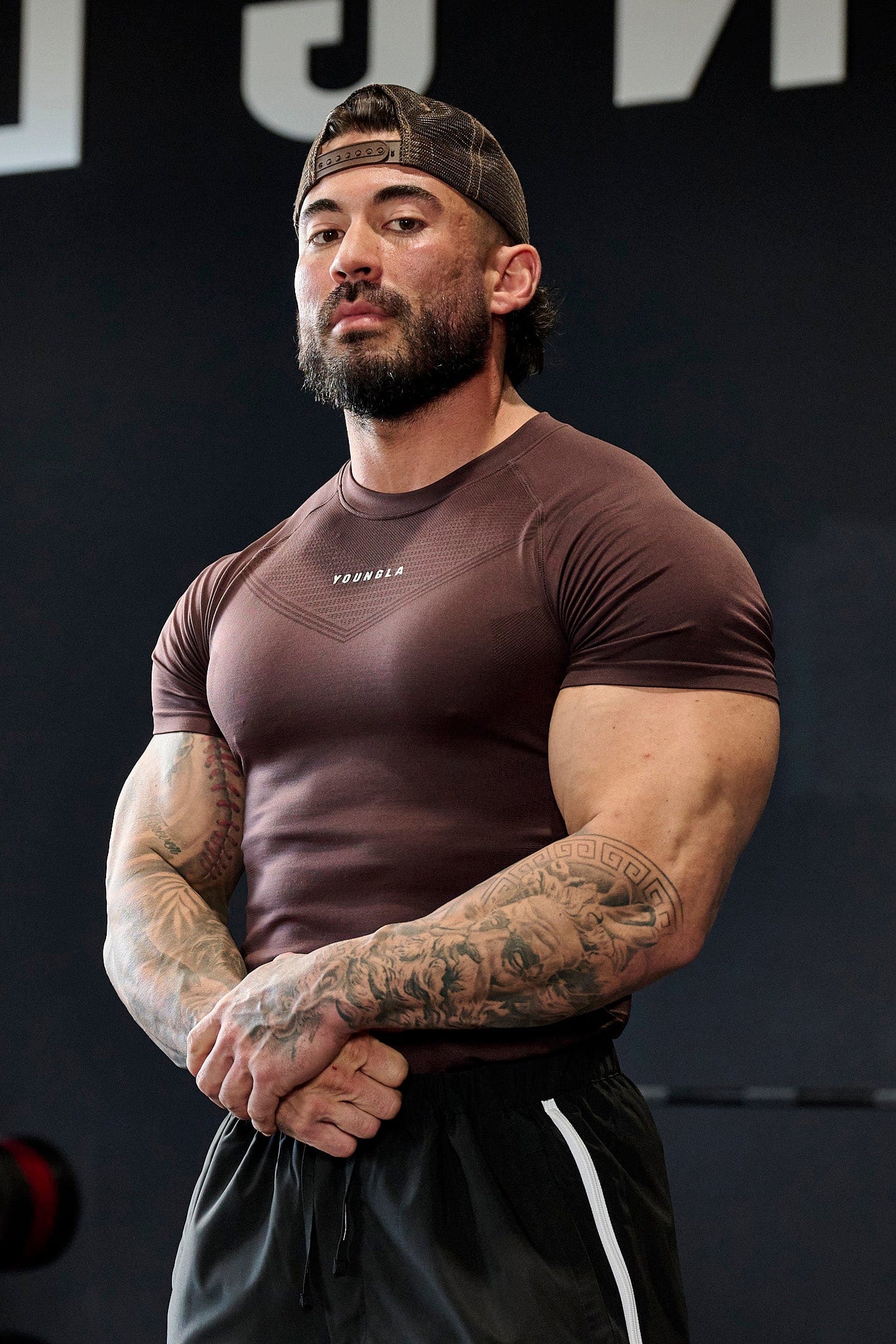 Man jogging outdoors in SuperVillain long sleeve workout shirt.