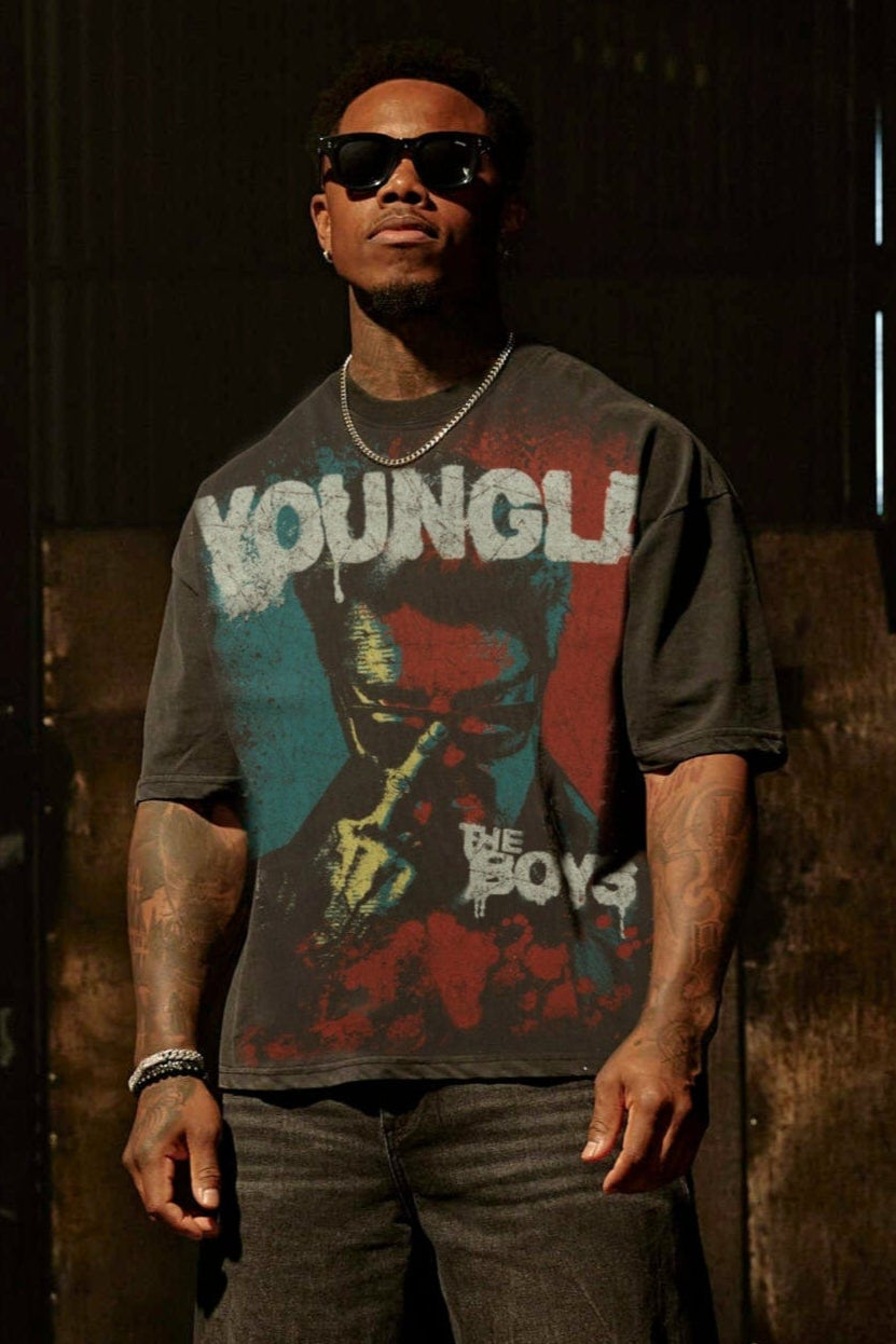 Front view of mens graphic t shirt styled for streetwear in black