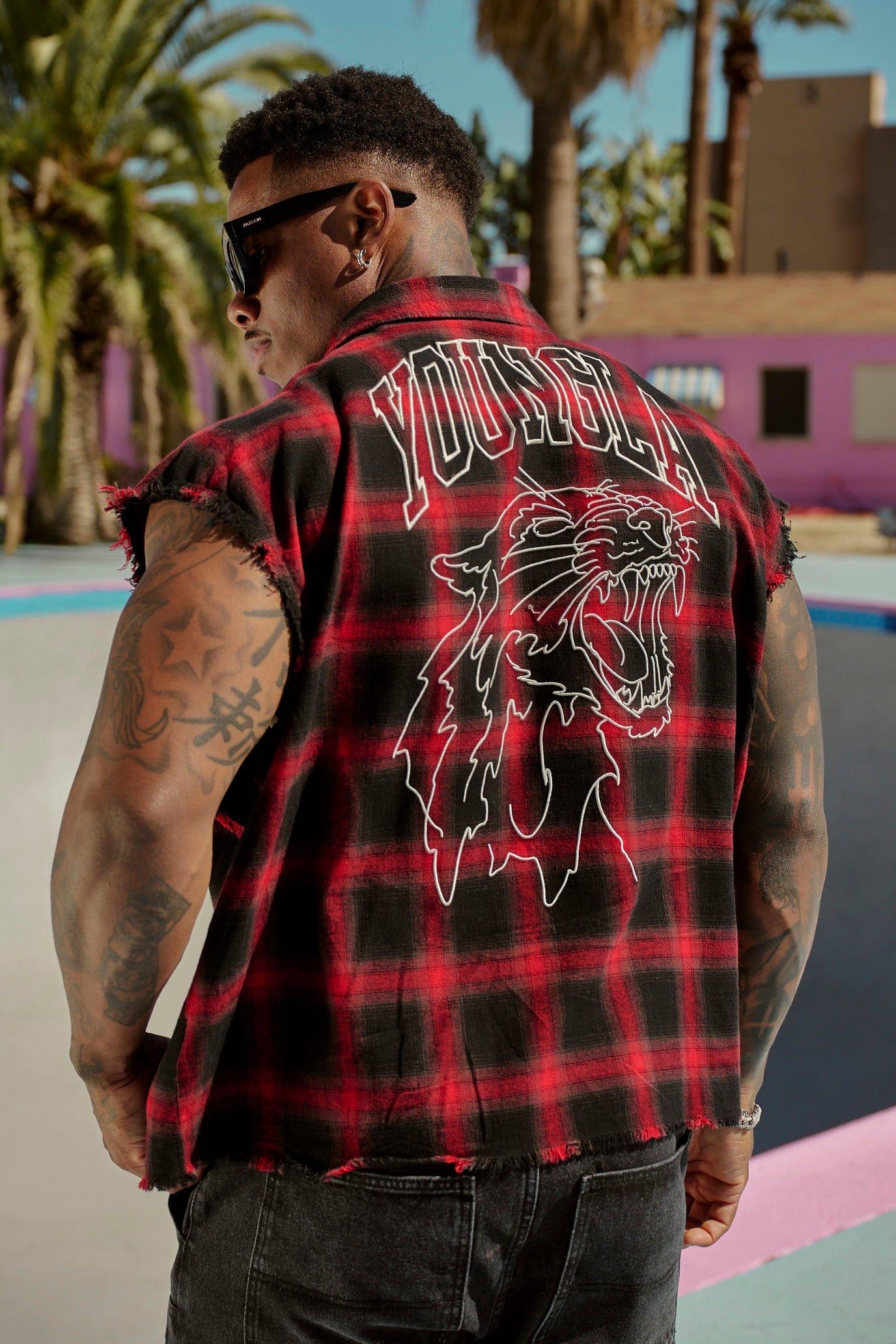 Close-up of the raw-cut sleeves of the flannel shirt jacket