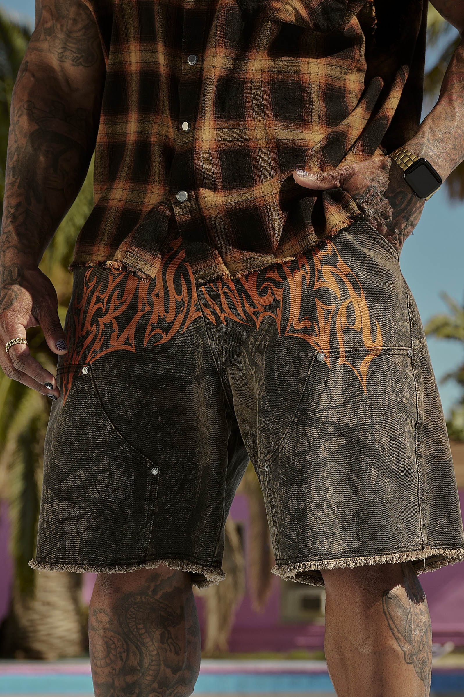 Model wearing Urban Vibe Baggy Jorts in a street setting.