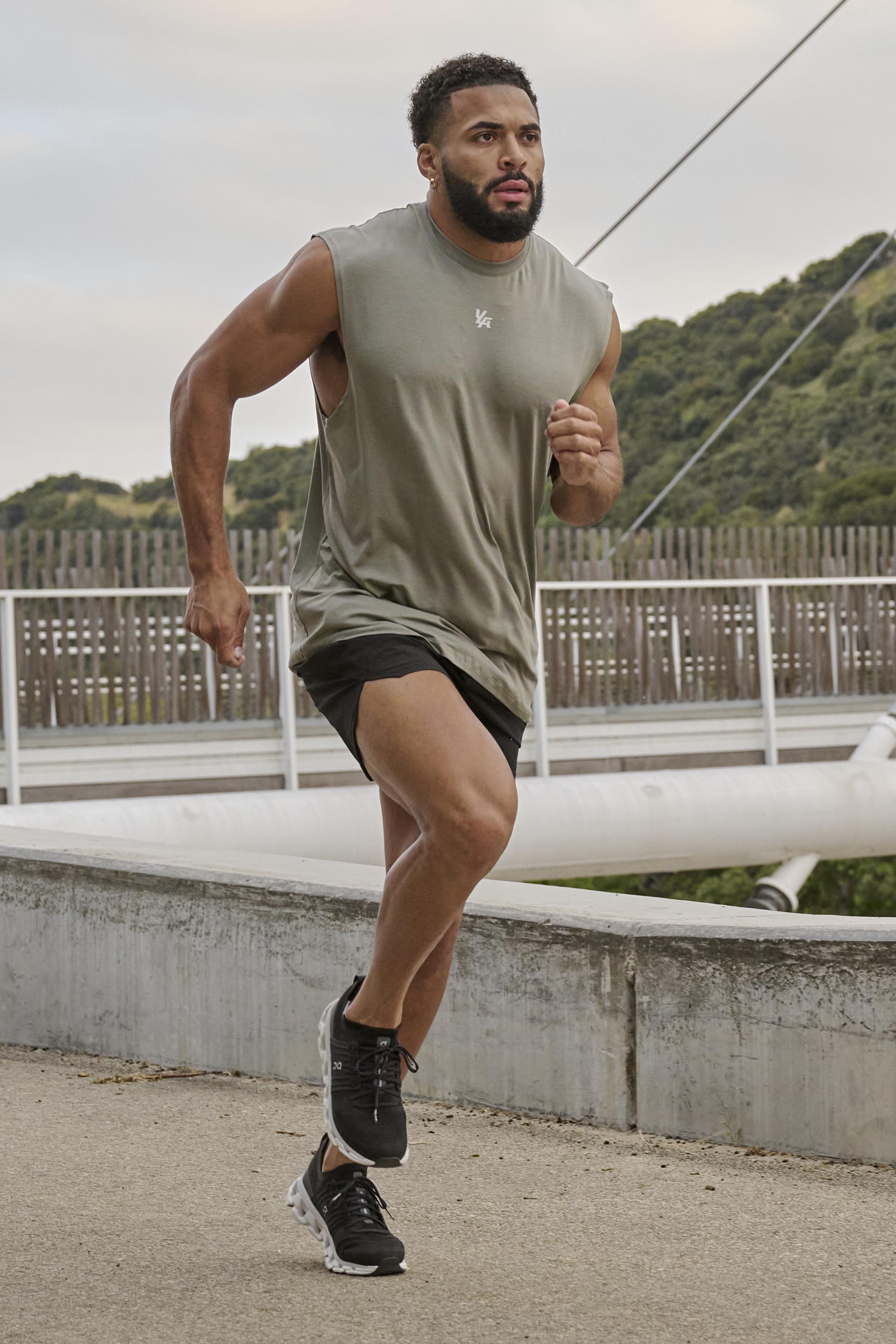 Close-up of RunTech running tank top fabric detail.