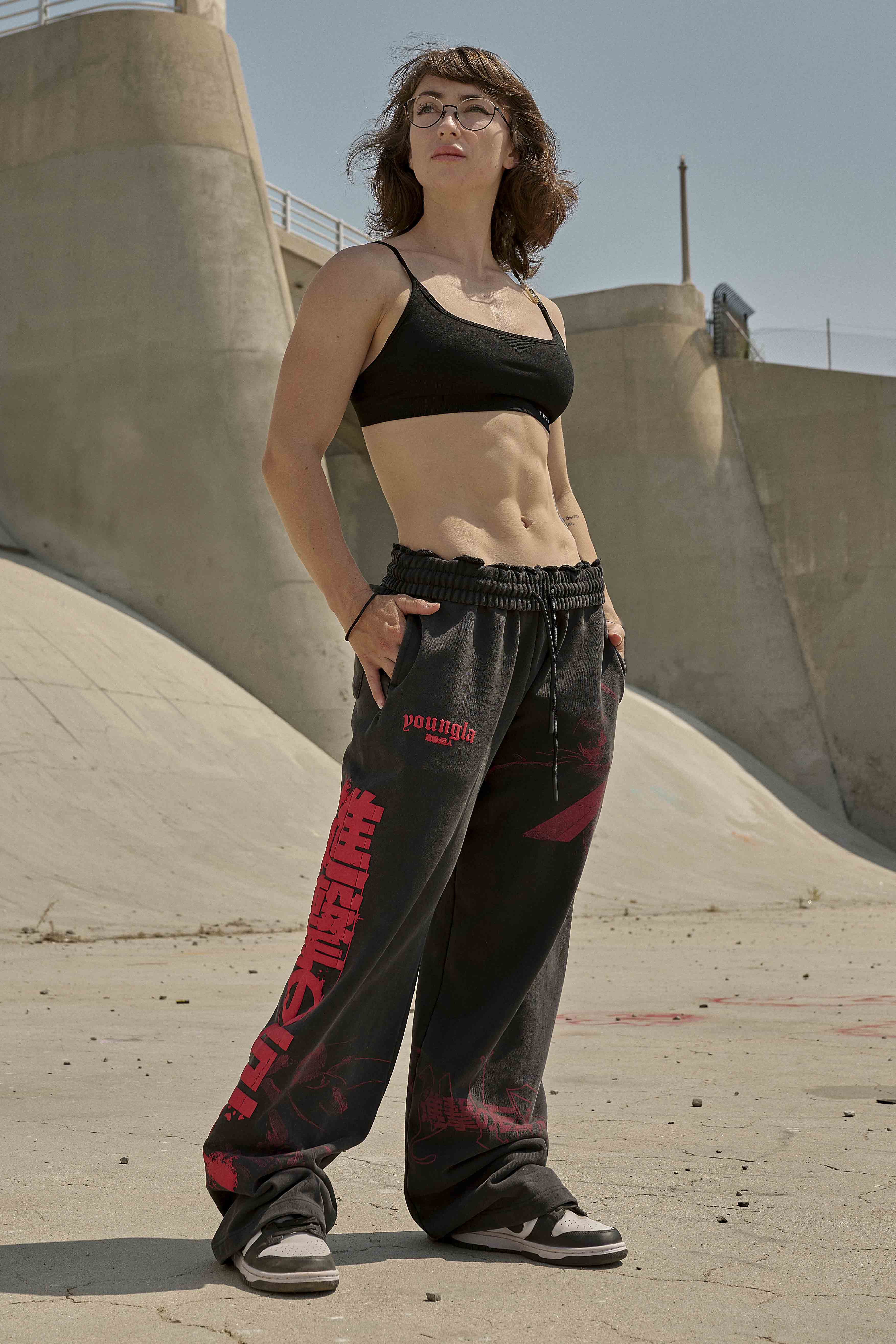 Close-up of Attack on Titan baggy joggers on display, highlighting the fabric and design.