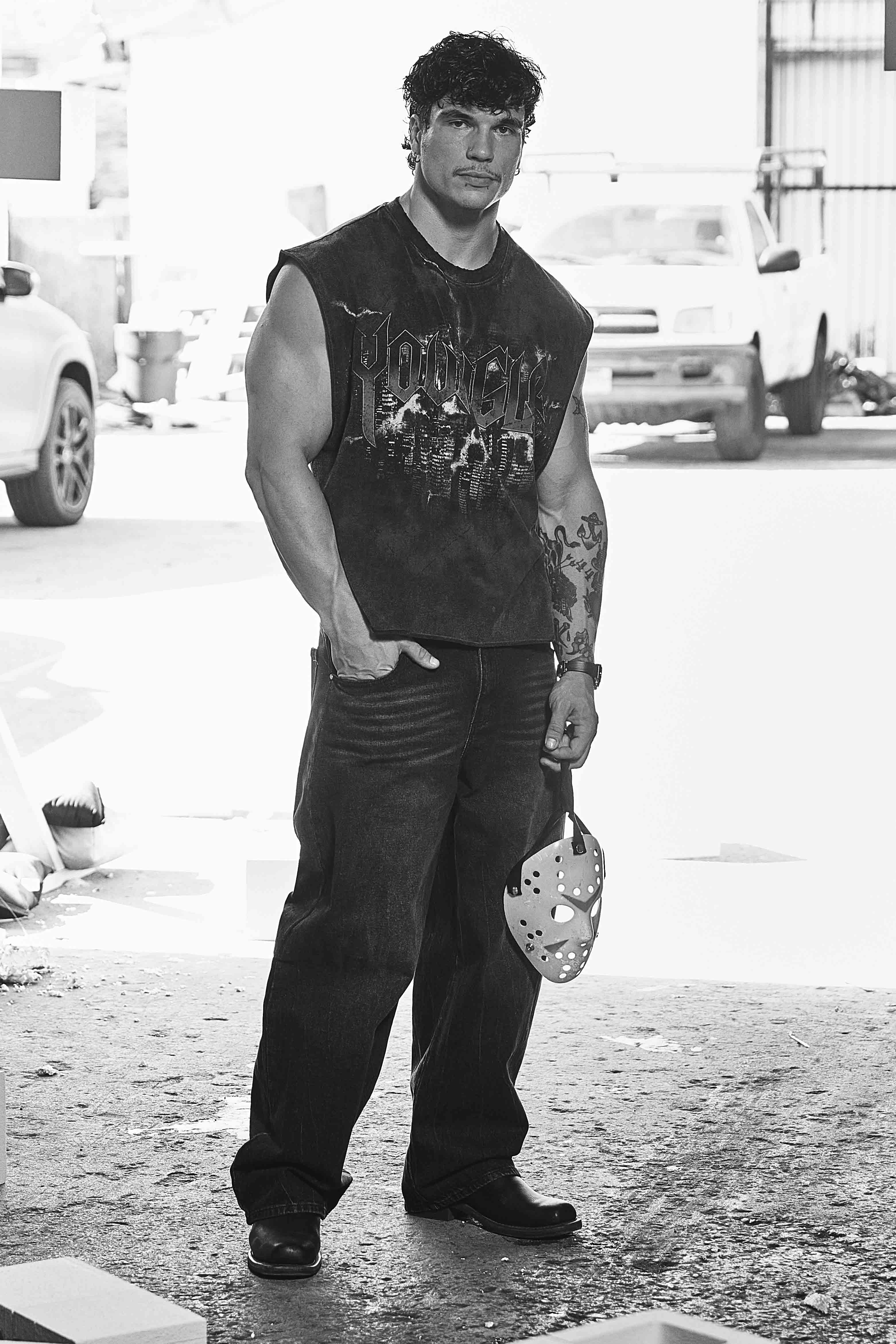 Front view of Urban Luxe graphic tank top with dark skyline print.