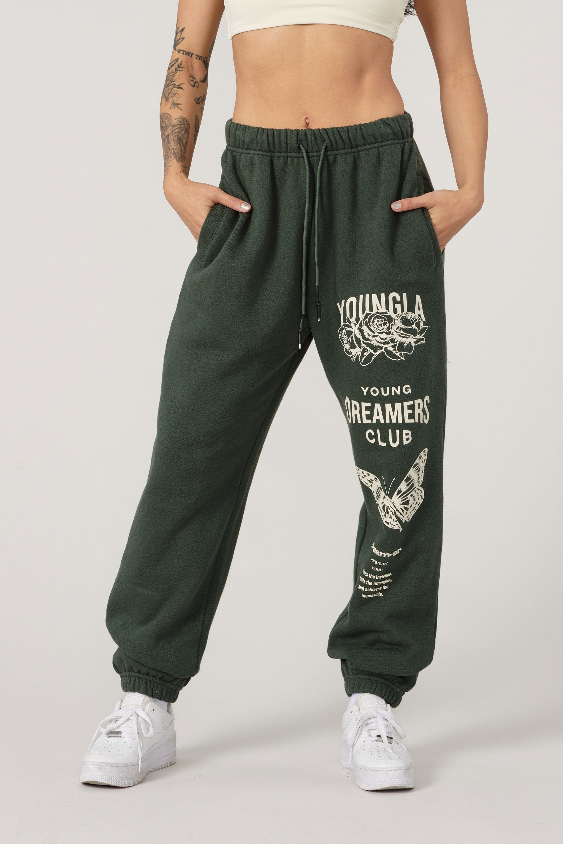 Close-up of young dreamers print on organic cotton joggers.