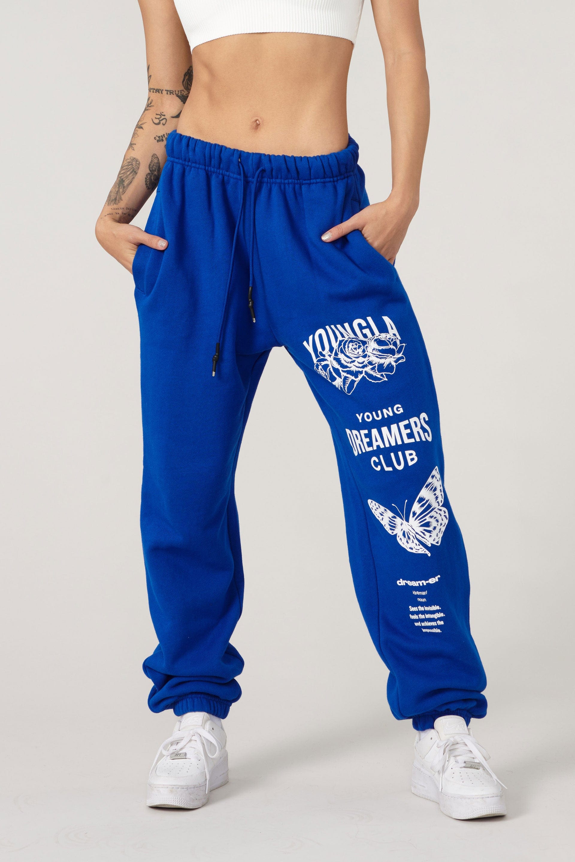 Front view of model in organic cotton joggers, perfect for athleisure wear.