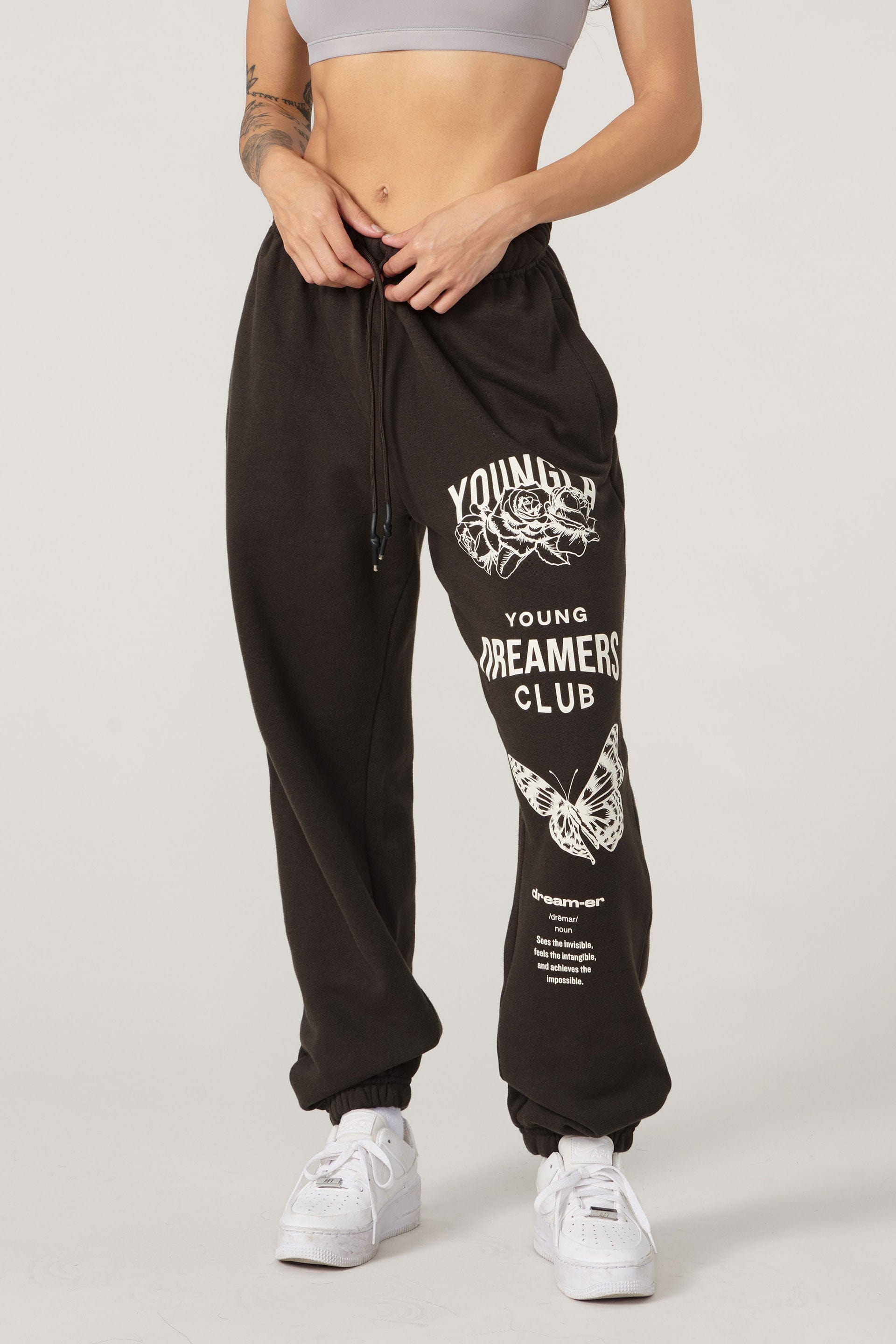 Close-up of young dreamers print on organic cotton joggers.