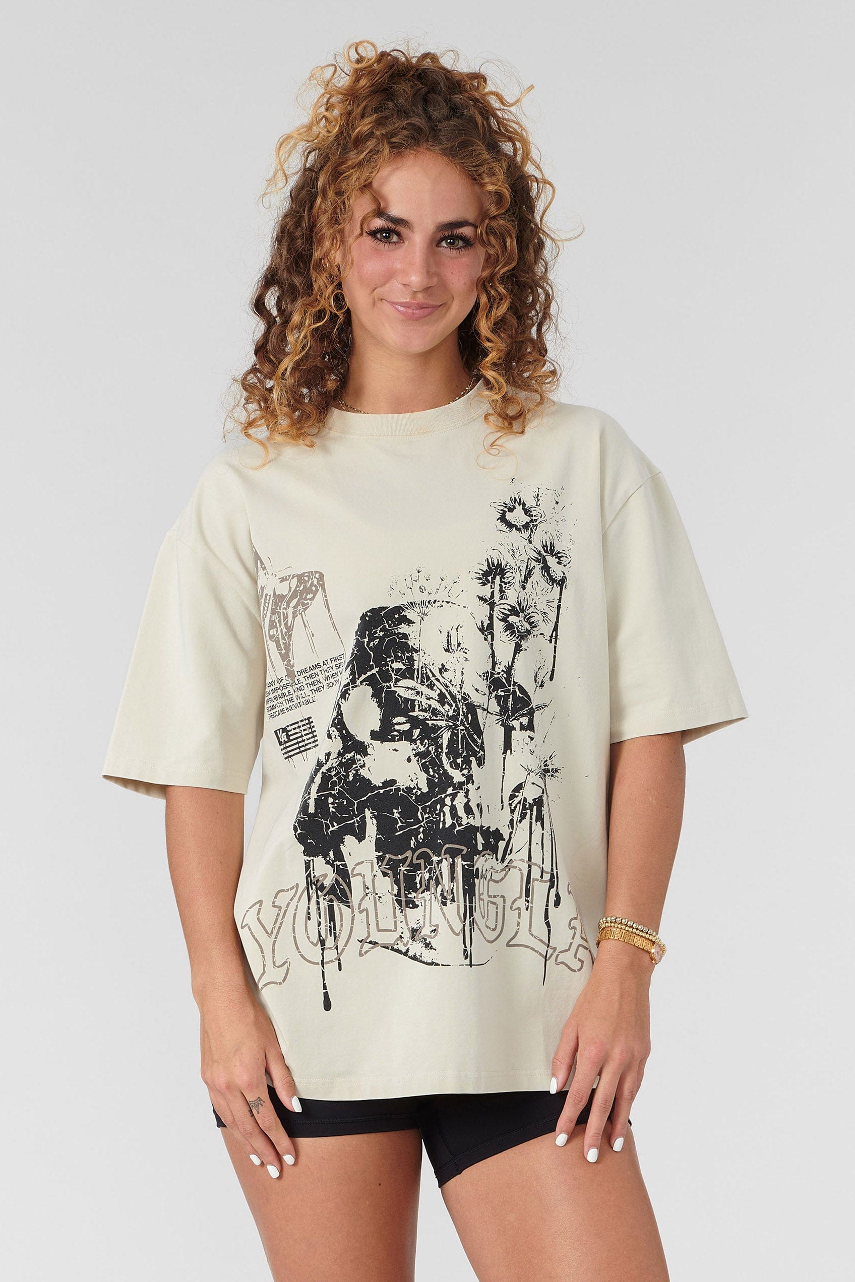 Front view of the oversized cotton tee showcasing its rustic design.