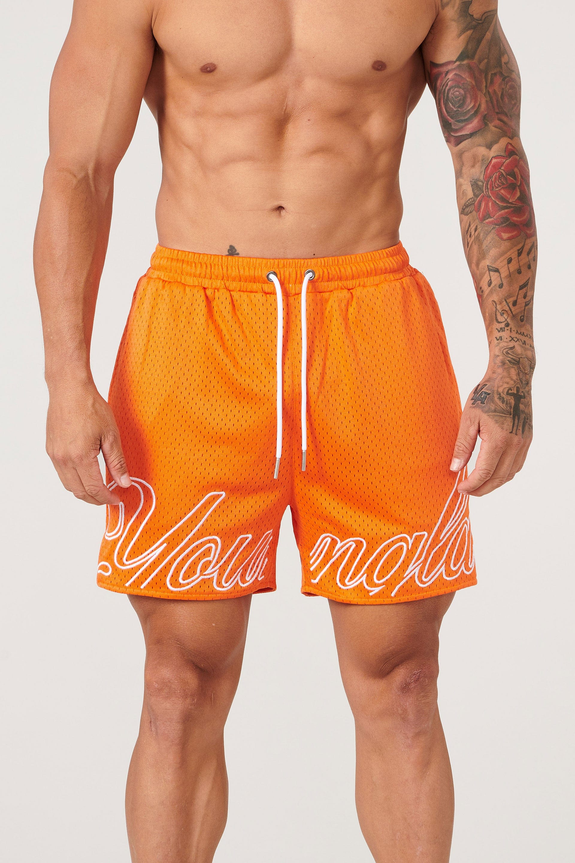 YoungLA mesh gym shorts in black, showing side pocket detail