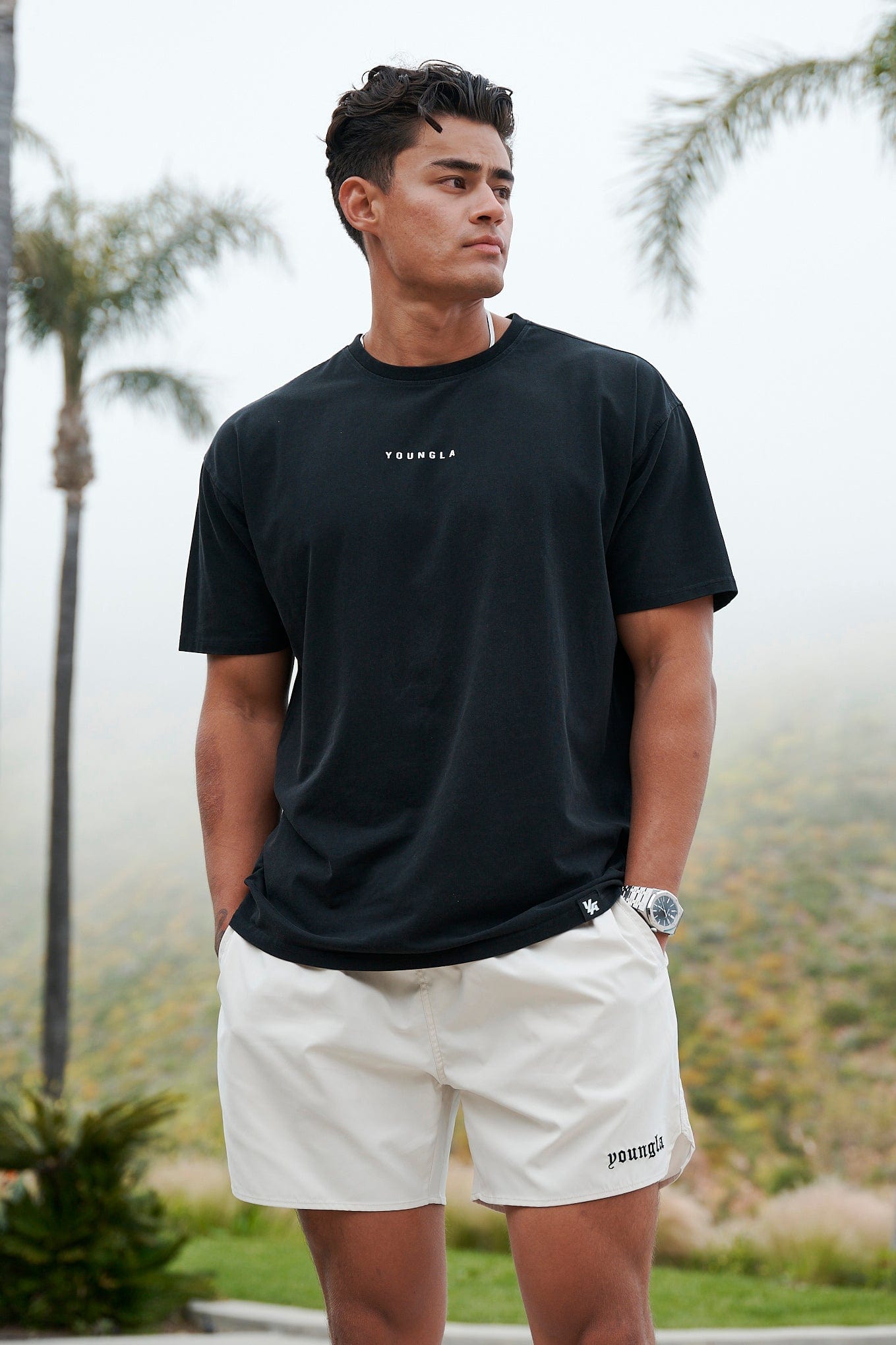 Front view of mens casual shorts in camouflage, ideal for summer outings.