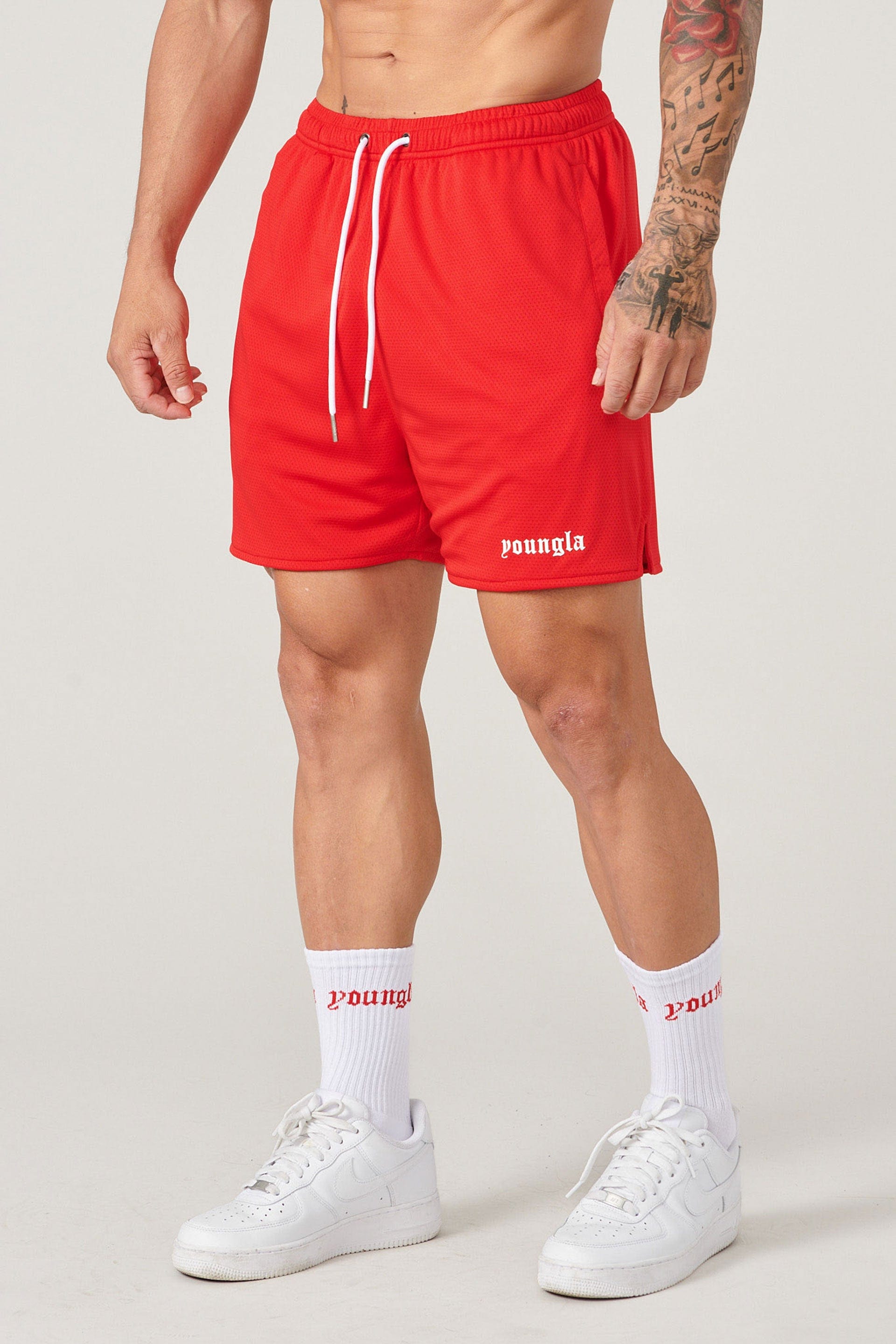 Player wearing matching shorts and socks during a basketball game