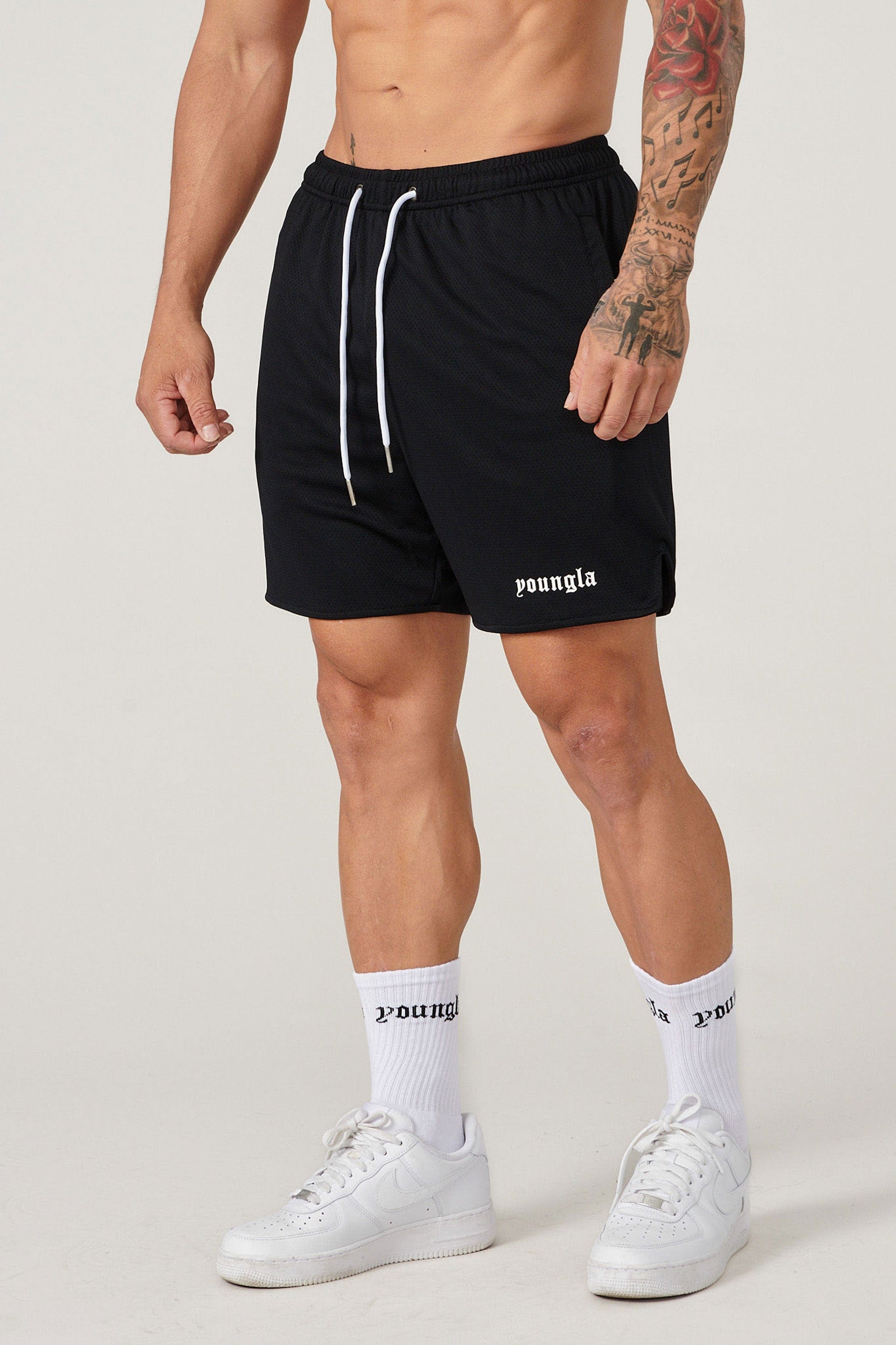 Athletic socks paired with game shorts for a complete sports look