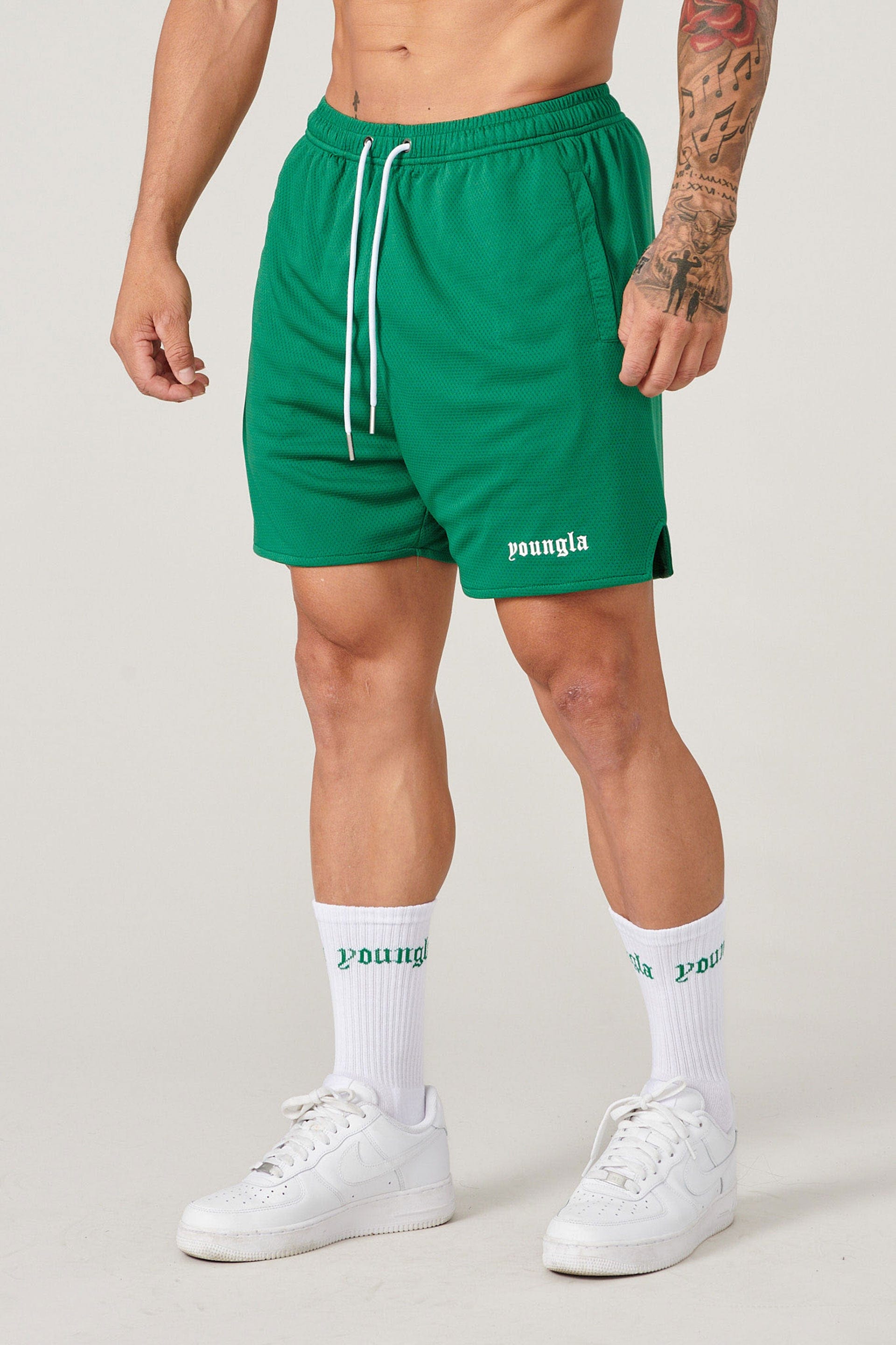 Player wearing matching shorts and socks during a basketball game