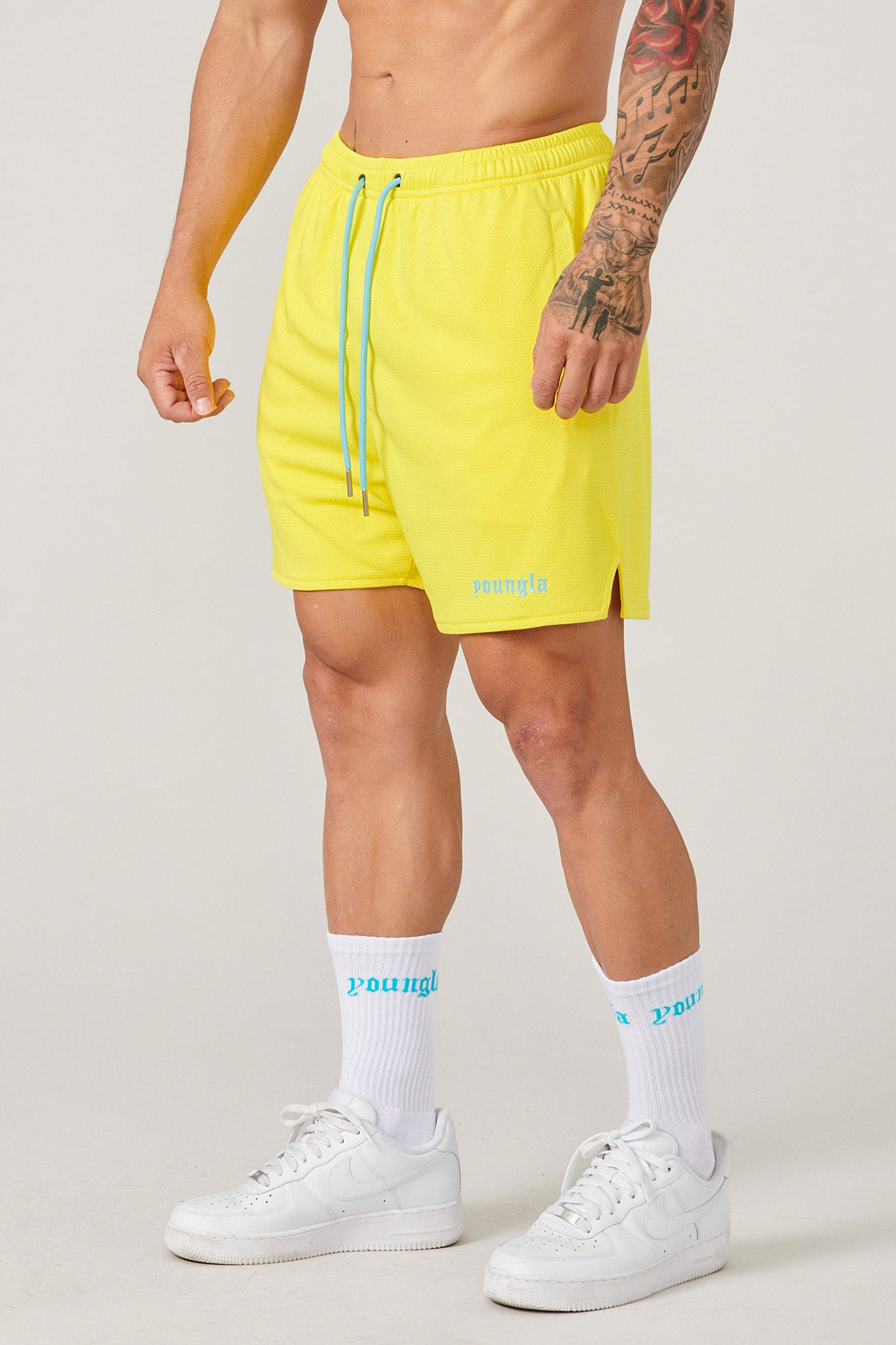 Close-up of mens basketball shorts with breathable mesh fabric