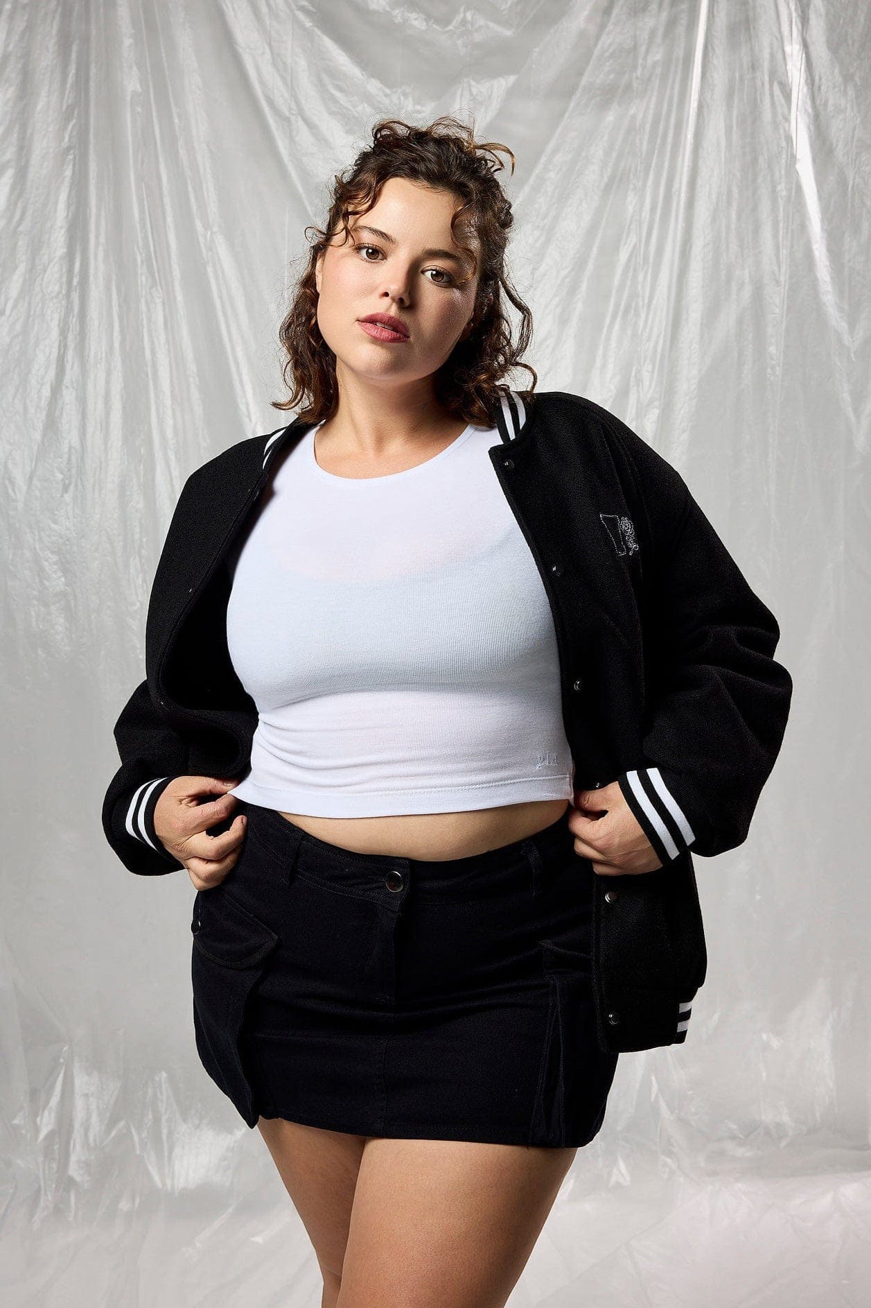 Side angle of oversized jacket showing relaxed fit and winter layering