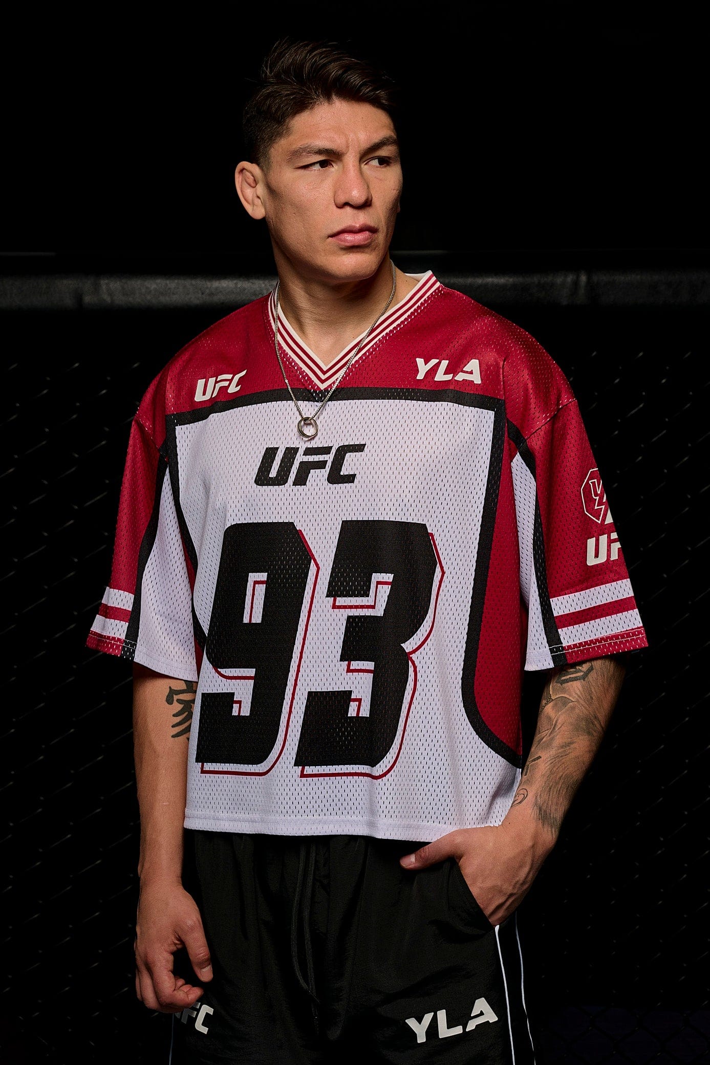 Front view of UFC x YoungLA athletic jersey on a model, showcasing its breathable mesh fabric.