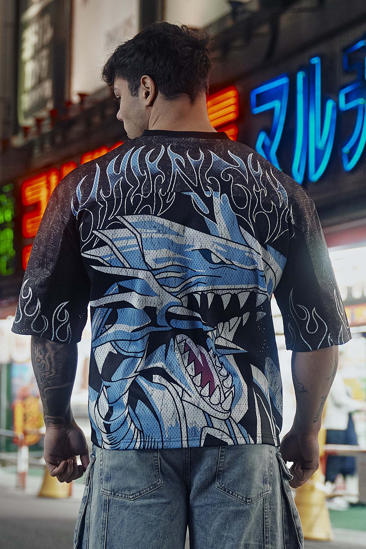 Front view of Yu-Gi-Oh! graphic jersey with character designs.