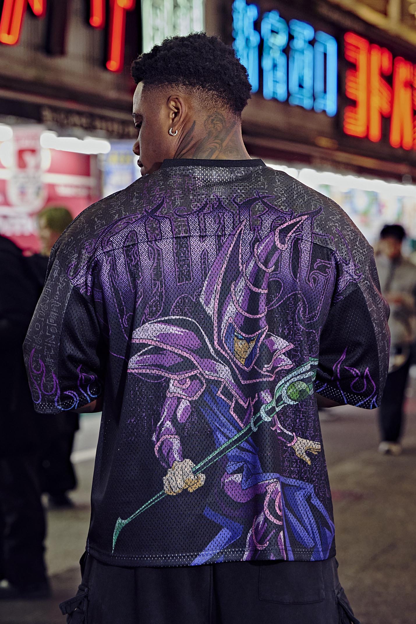 Front view of Yu-Gi-Oh! graphic jersey with character designs.