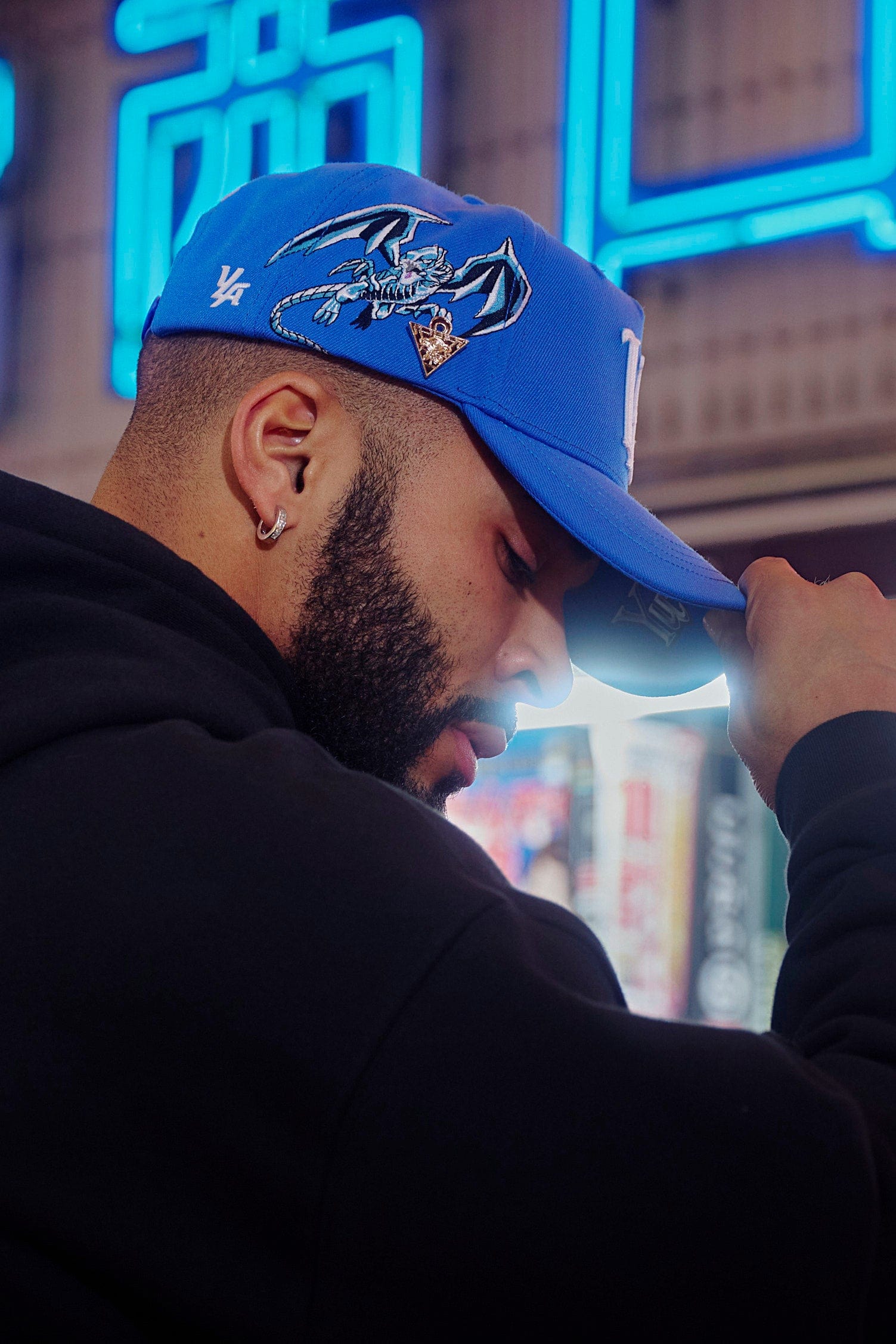 Model wearing the Yu-Gi-Oh!® cap at an anime convention.