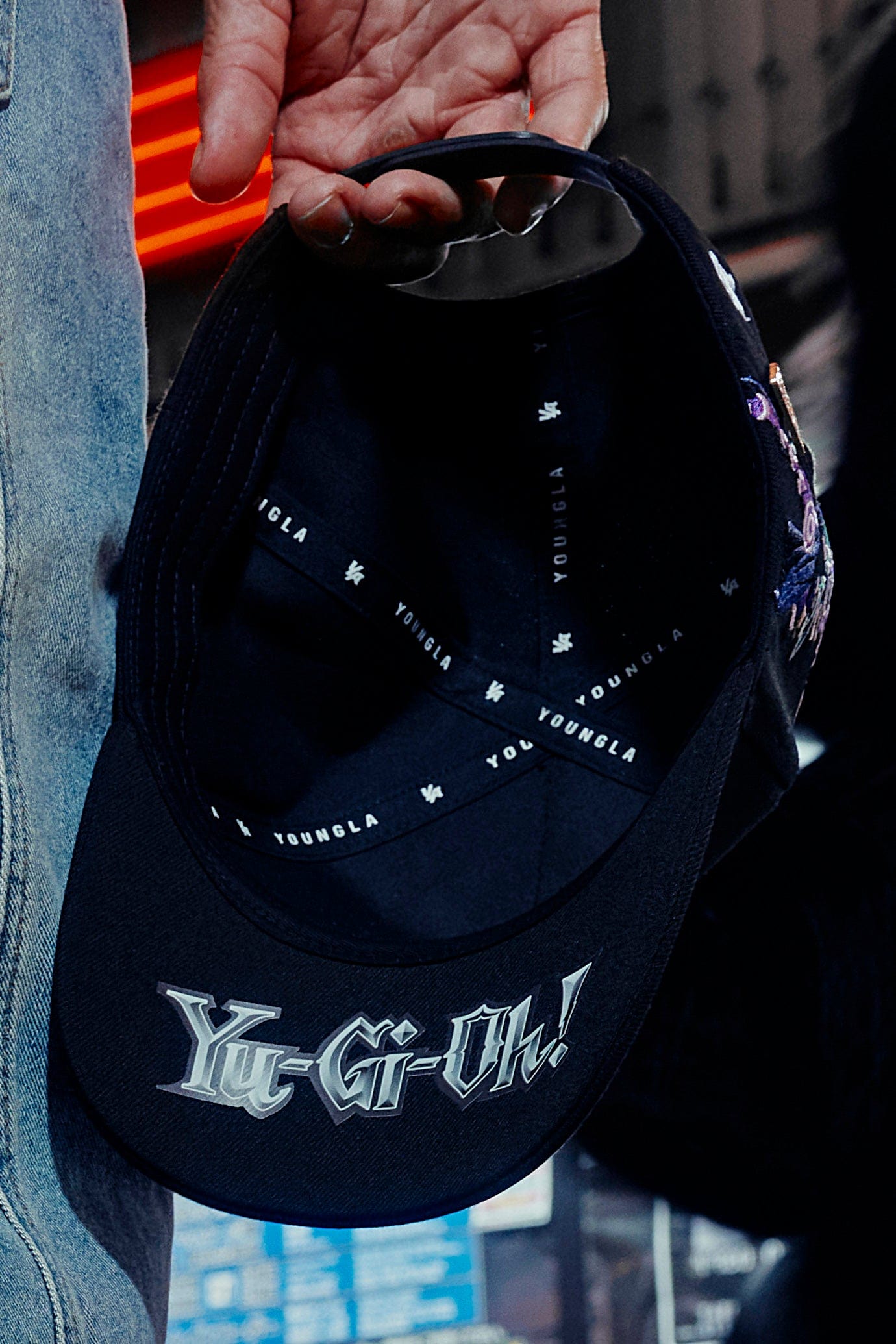 Side view of the Yu-Gi-Oh!® A-Frame Cap showcasing embroidery.
