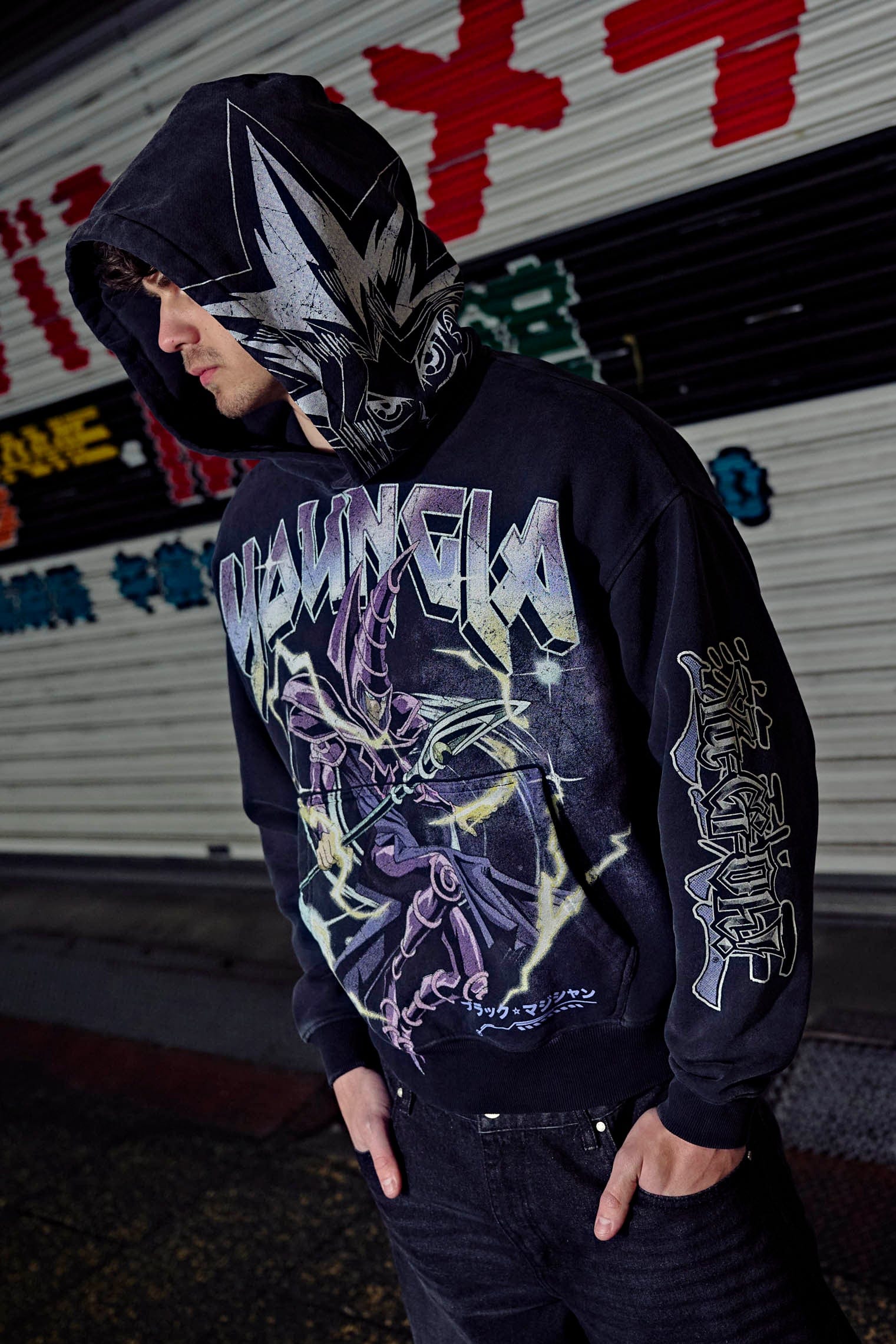 Close-up of the graphic details on the sleeves of the Yu-Gi-Oh! hoodie.