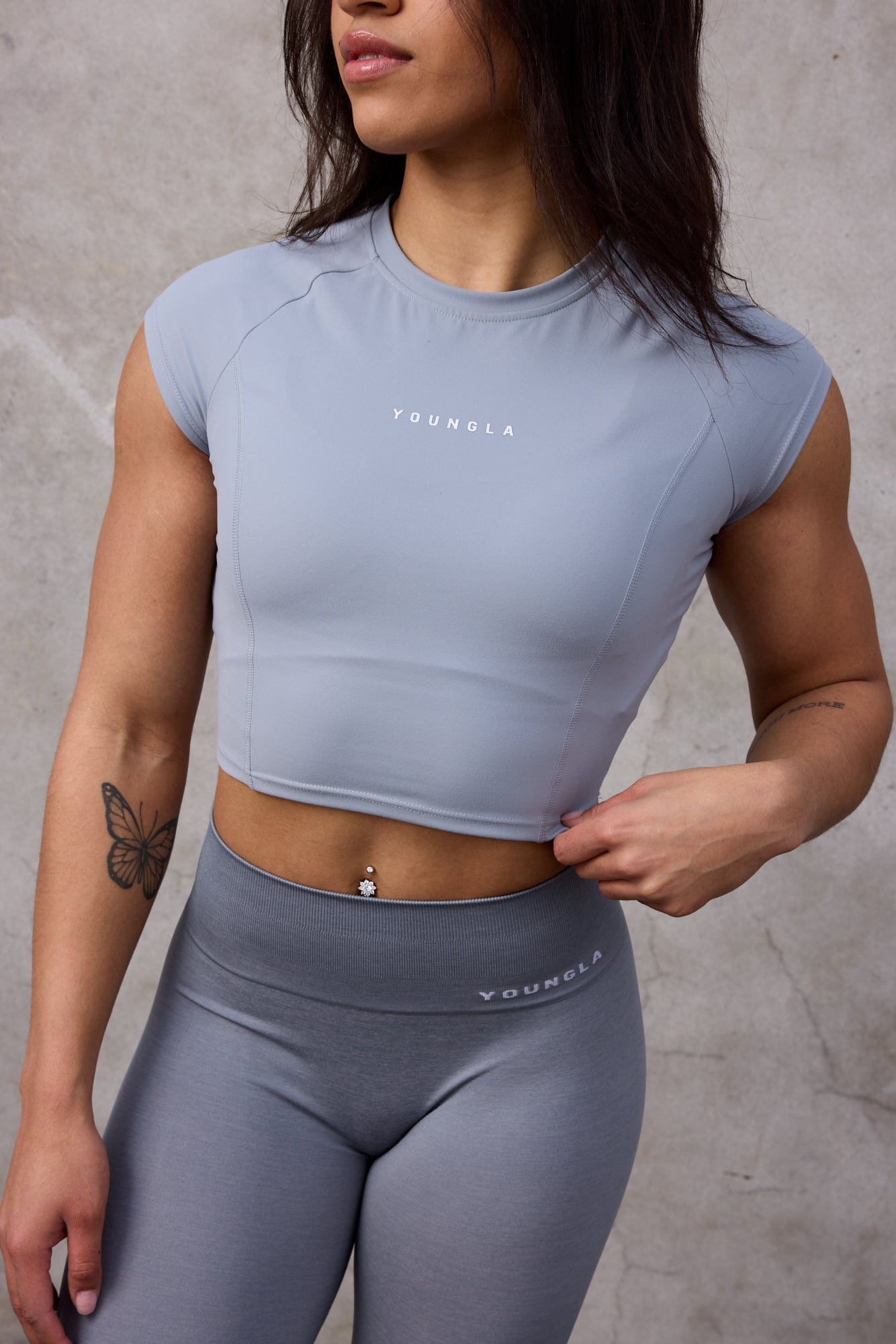 Side view showcasing the fit of the Elevate Compression Crop Top.