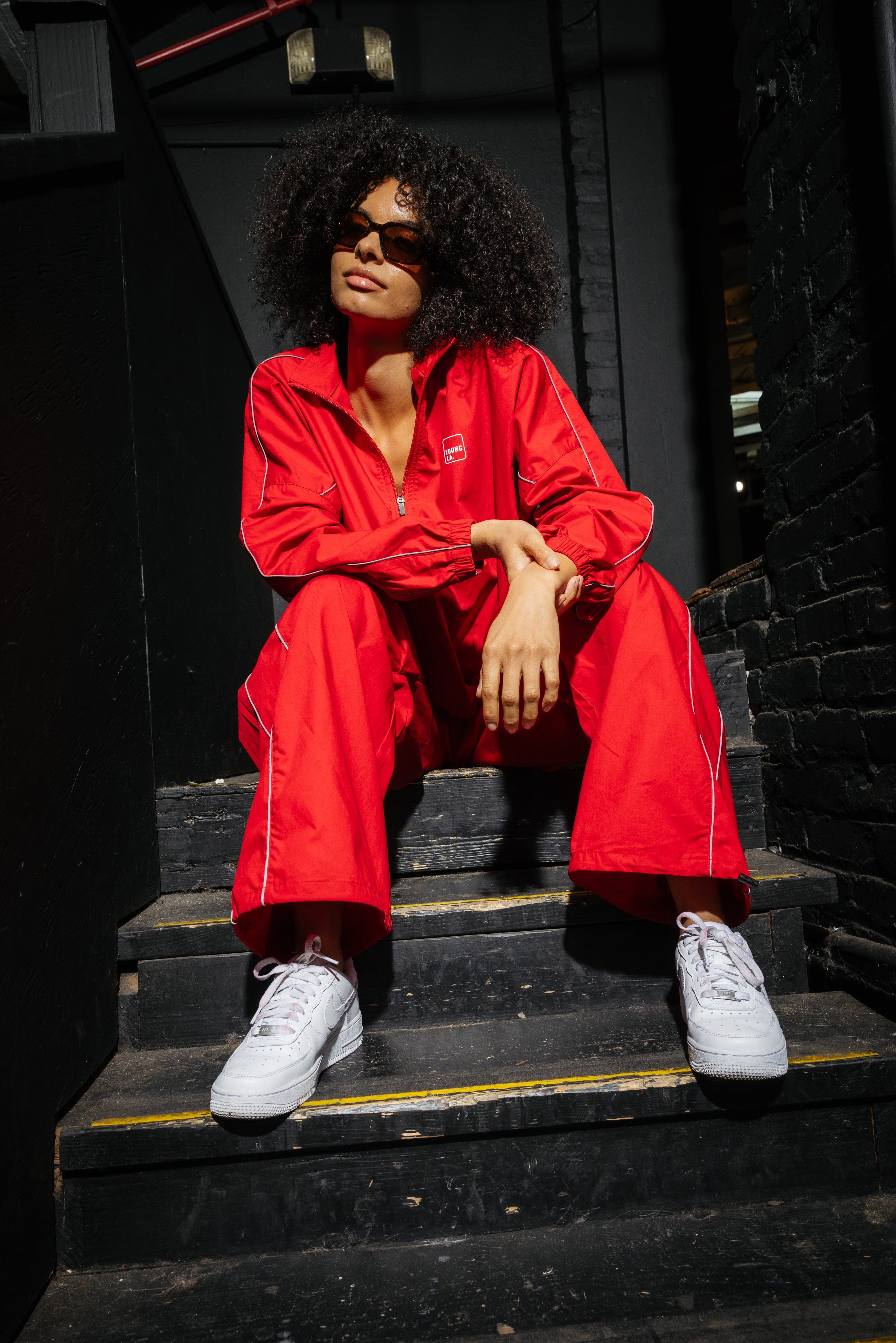Side view of cotton track pants for women with reflective details for evening walks