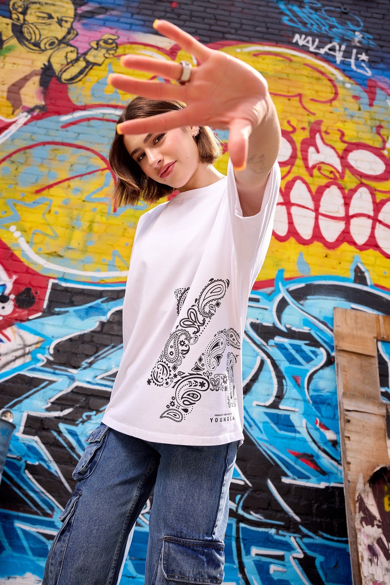 Model wearing the bandana tee at a music festival.