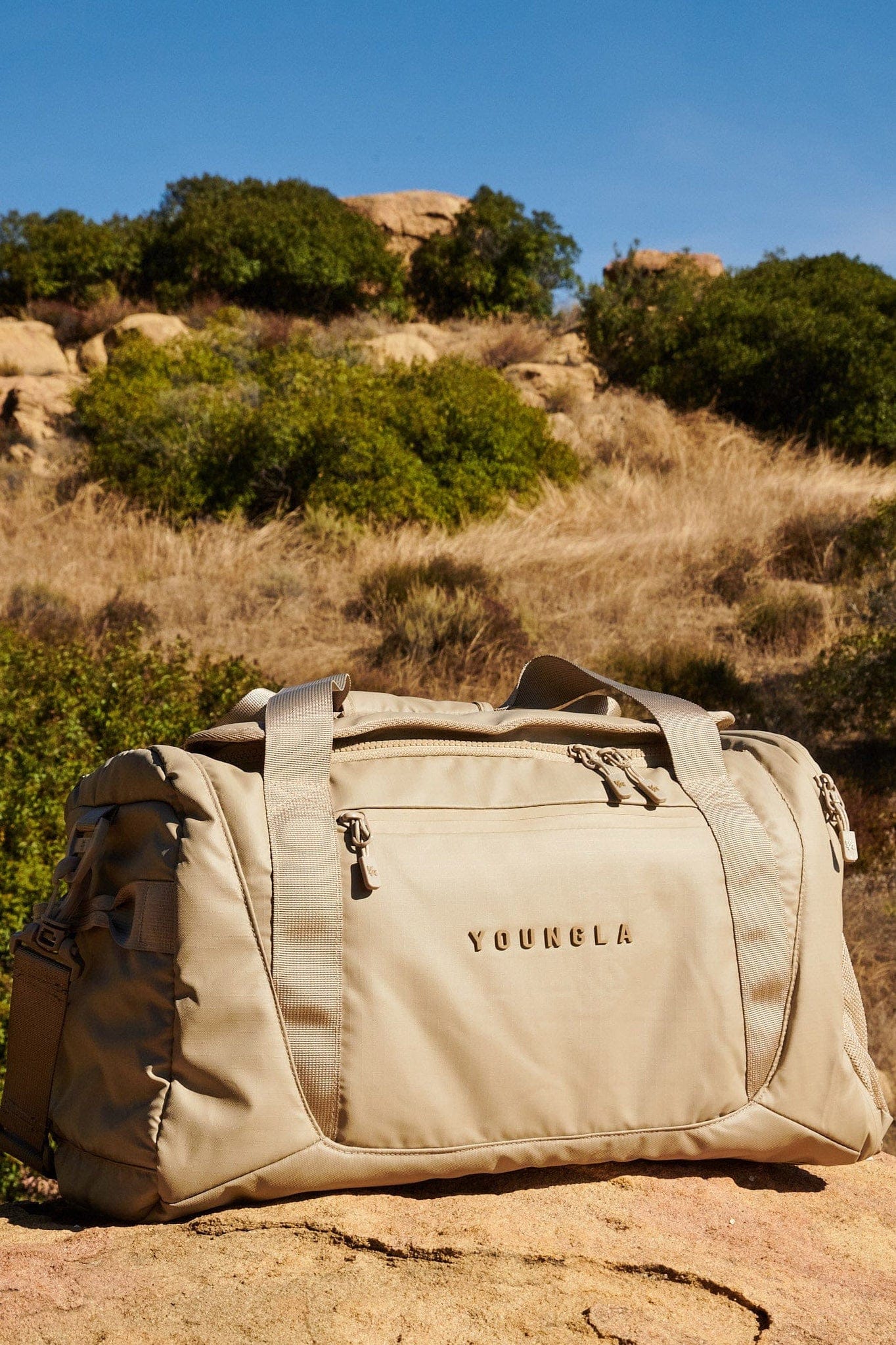 Top-down view of gym bag showing roomy interior and flap pocket—ideal for travel bags for women.