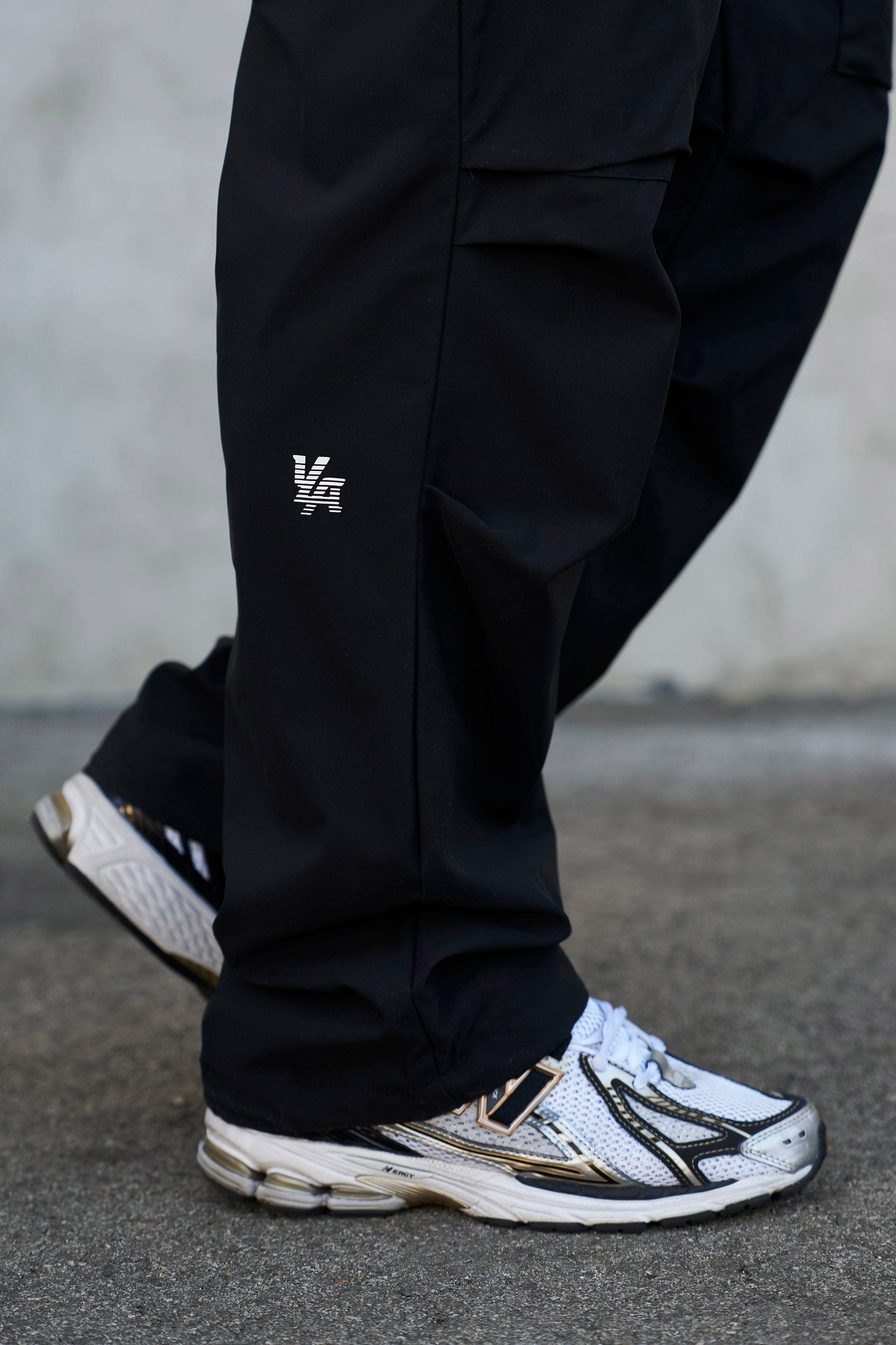 Close-up of Terrain waterproof pants showing adjustable waist strap