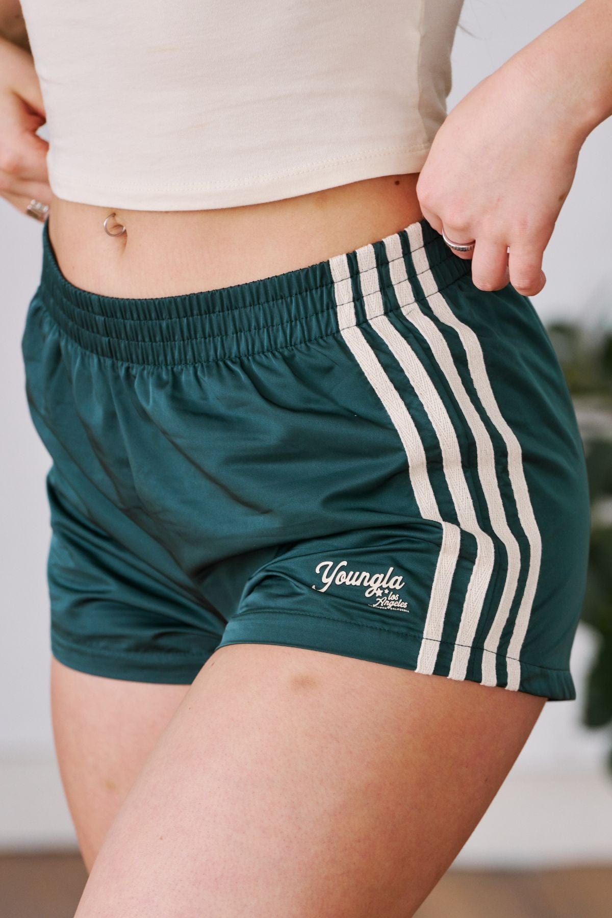 Model wearing S&S Activewear shorts on a hiking trail in Southern California