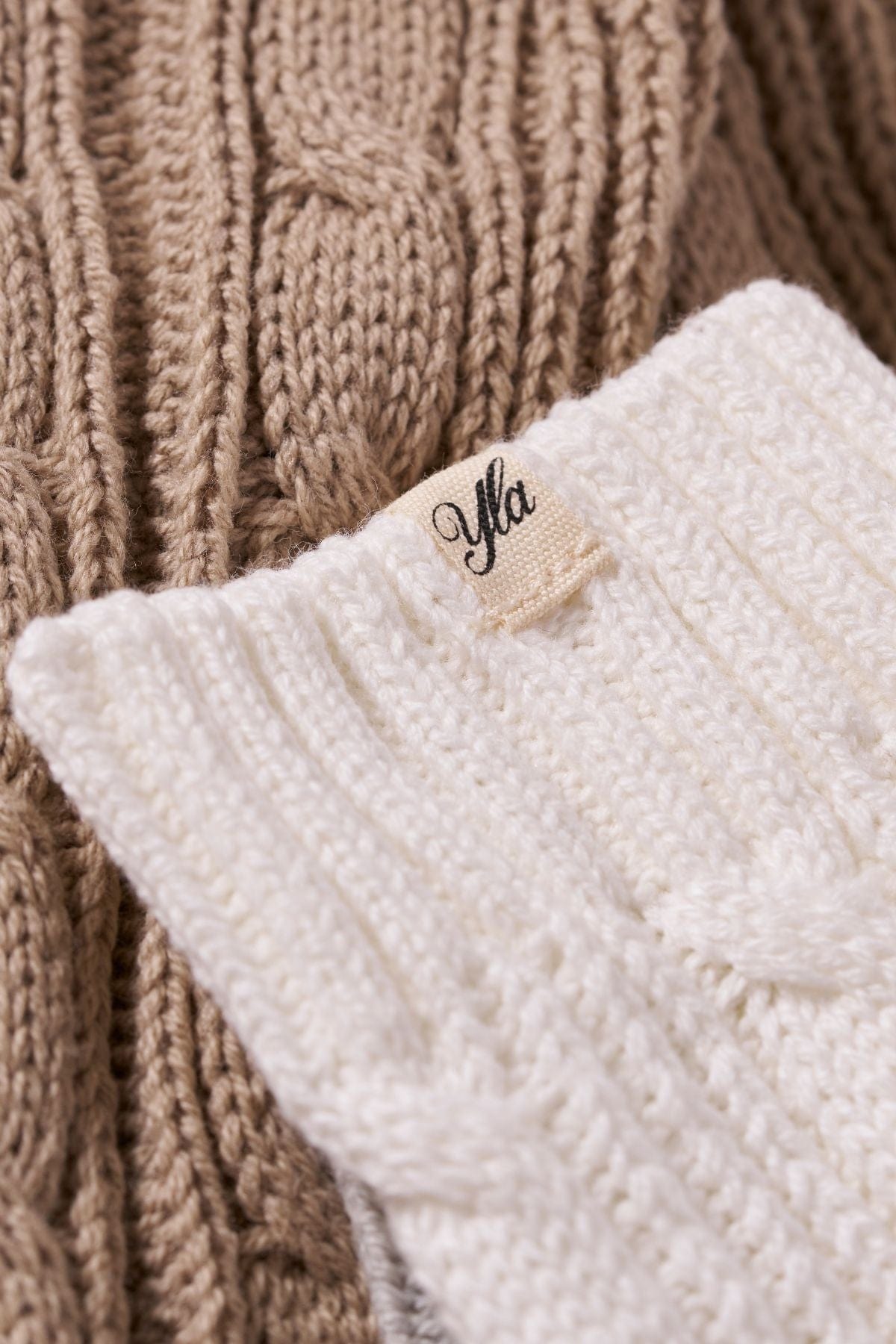 Model wearing Cozy Earth Toastie Socks while relaxing at home, perfect for cozy vibes.