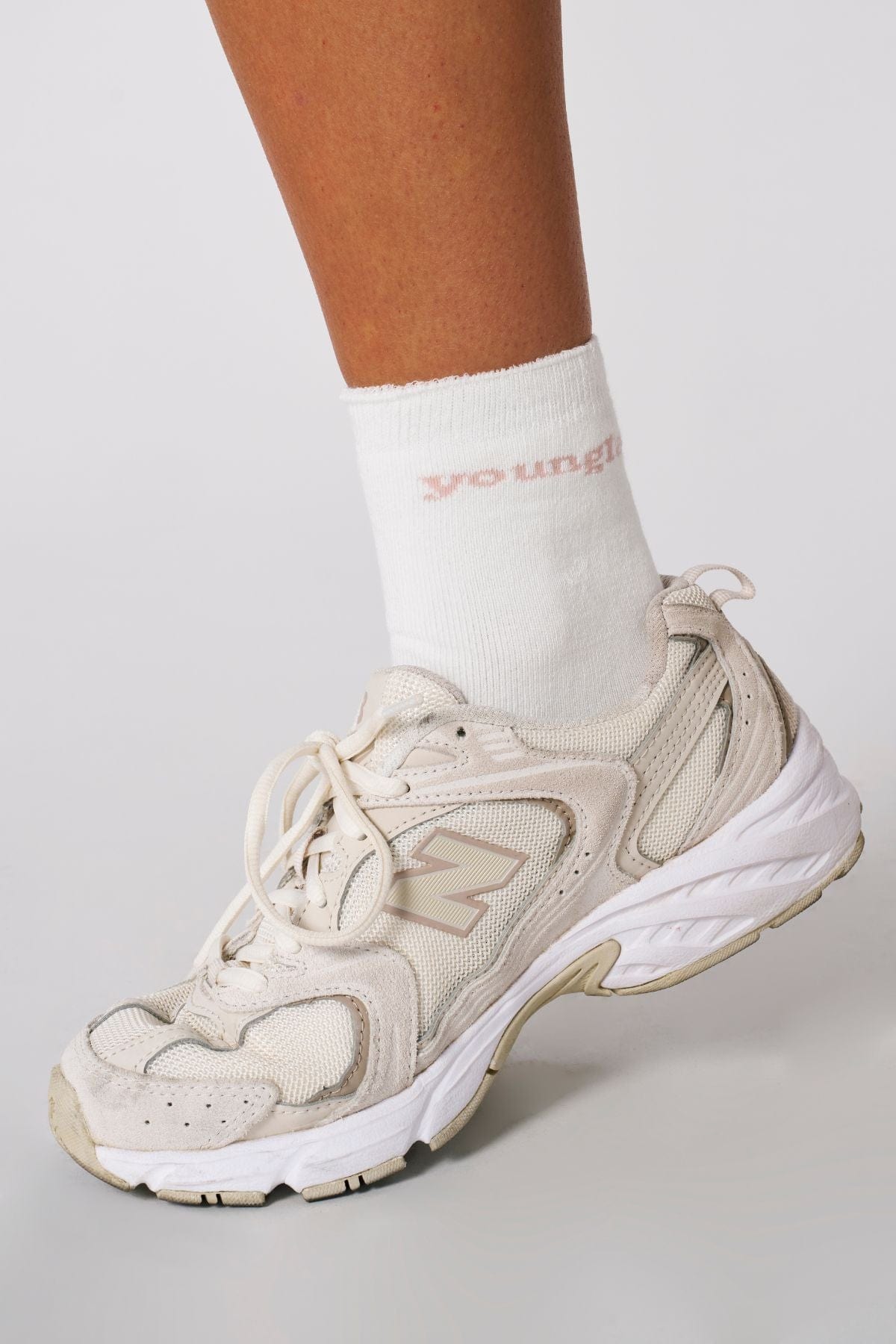 Balega Comfort Cloud Socks in pastel pink and cream, perfect for casual outings.