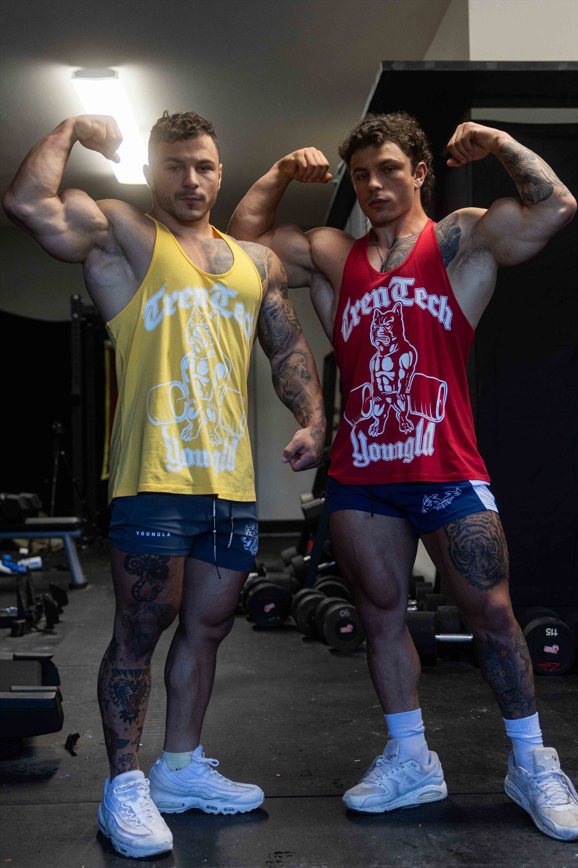 Side angle of mens workout shorts emphasizing quad muscle fit