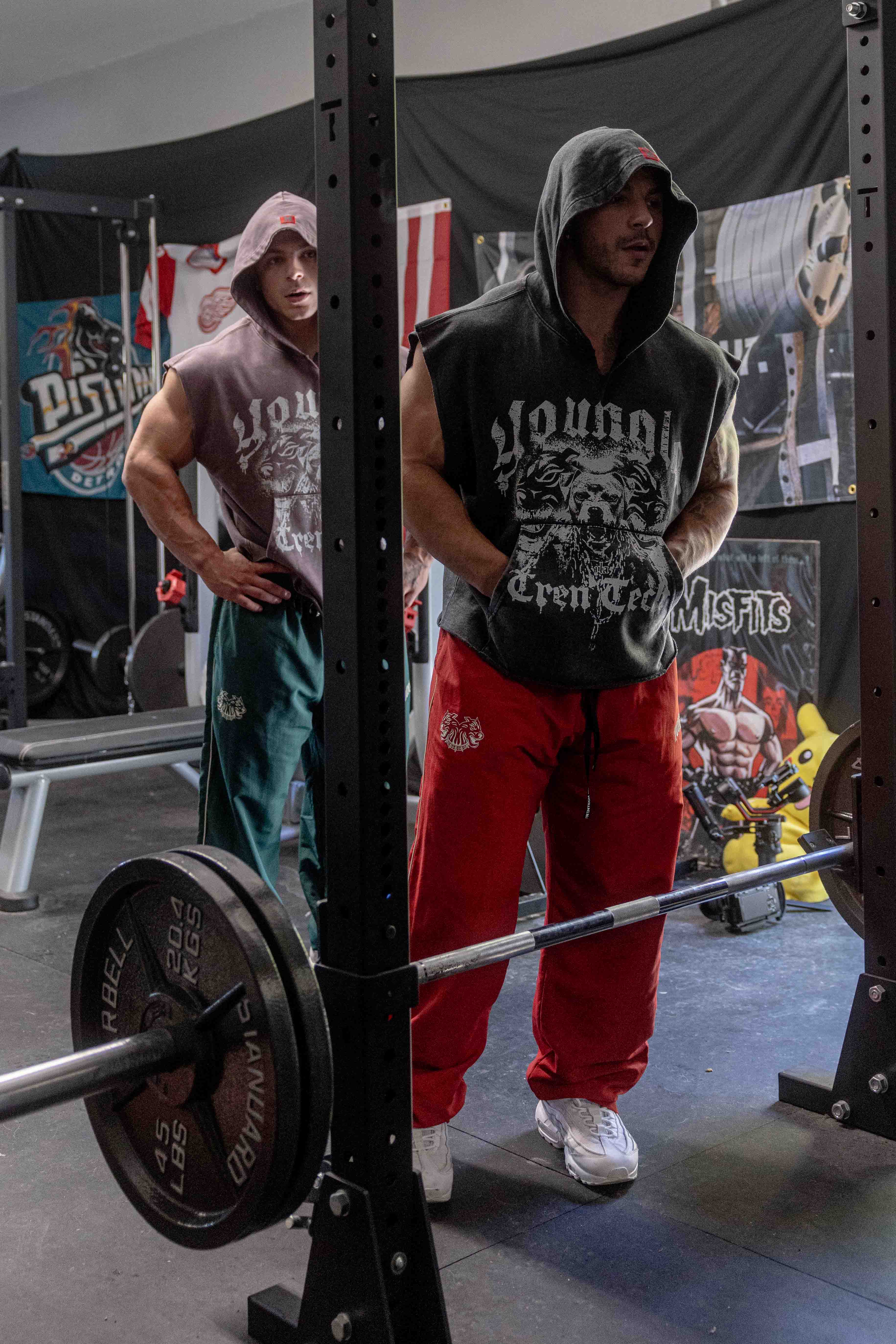 Close-up of Tren Twins camo sweatpants with contrasting side pipes.