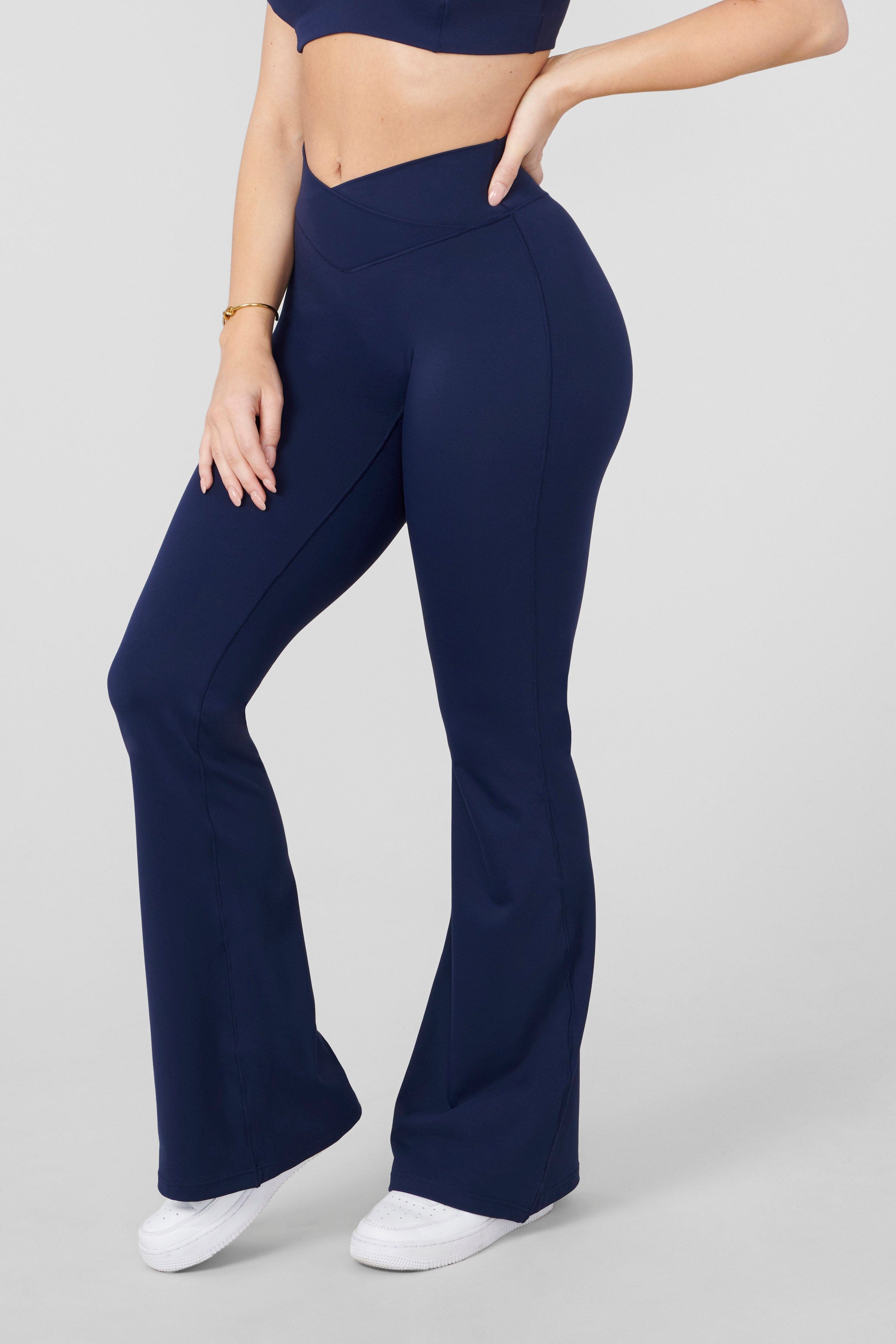 Front view of Vital Flare Leggings on a model, ideal for yoga.