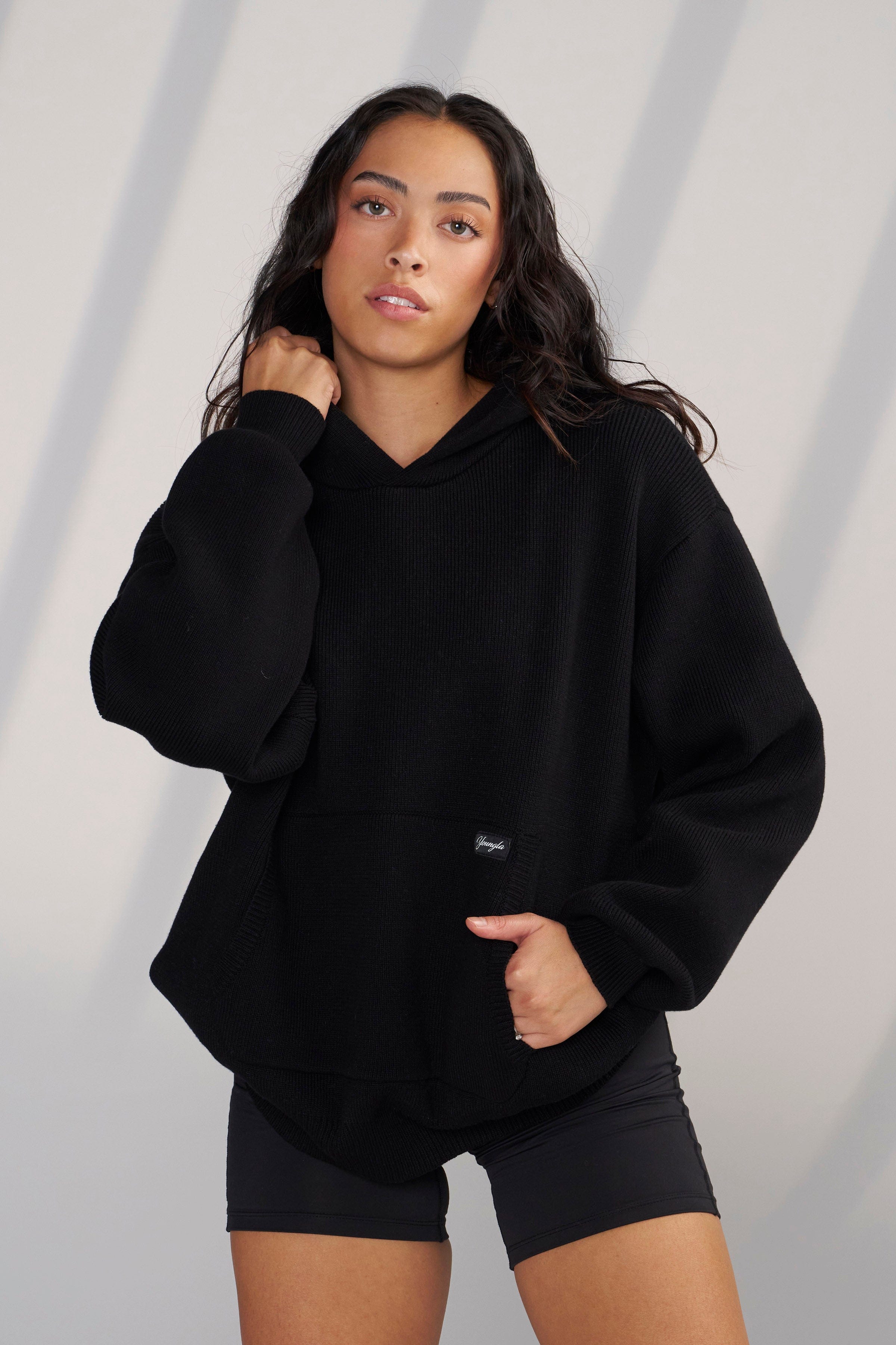 Side angle of Bella Luxe casual hoodie, highlighting the stylish design.