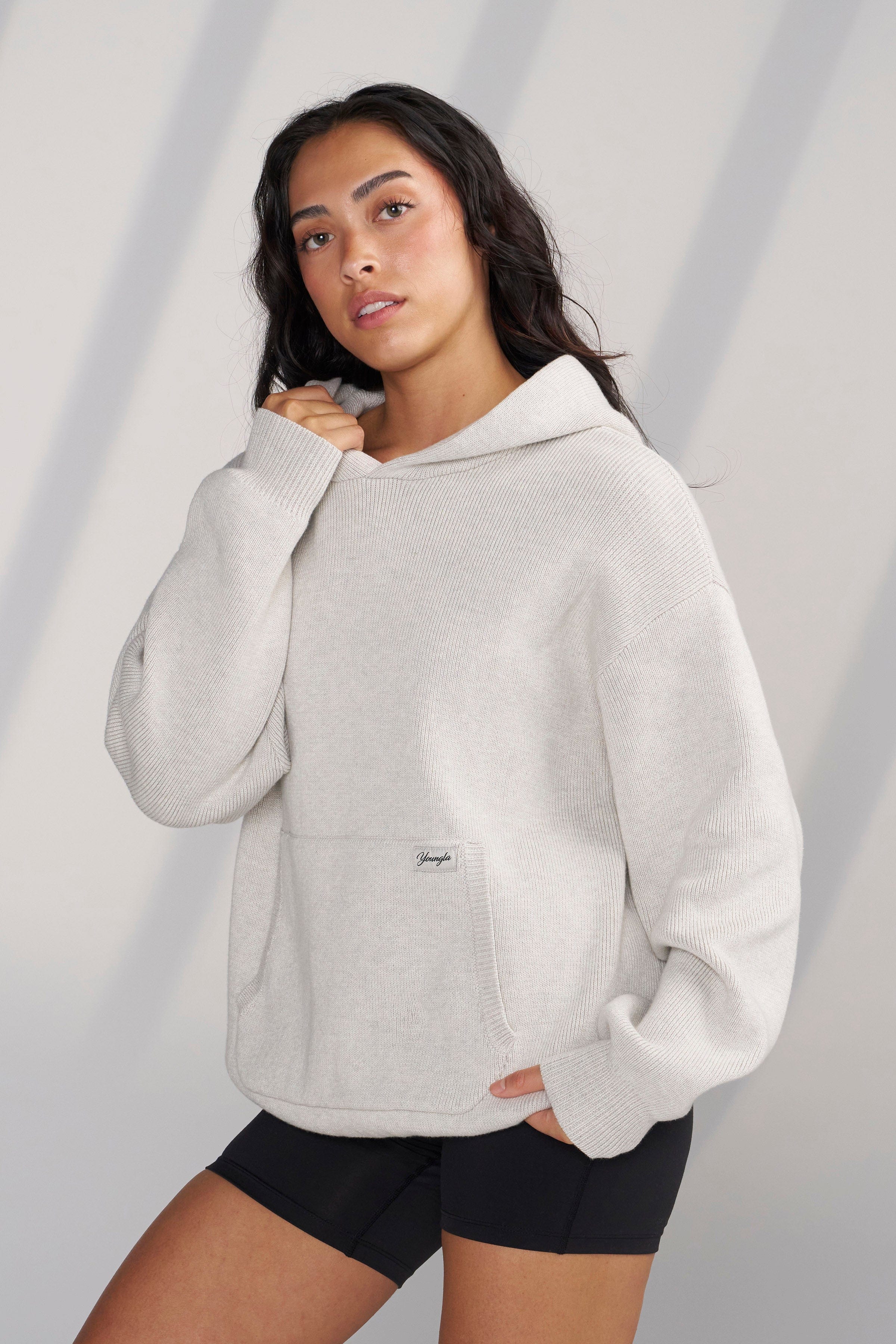 Side angle of Bella Luxe casual hoodie, highlighting the stylish design.
