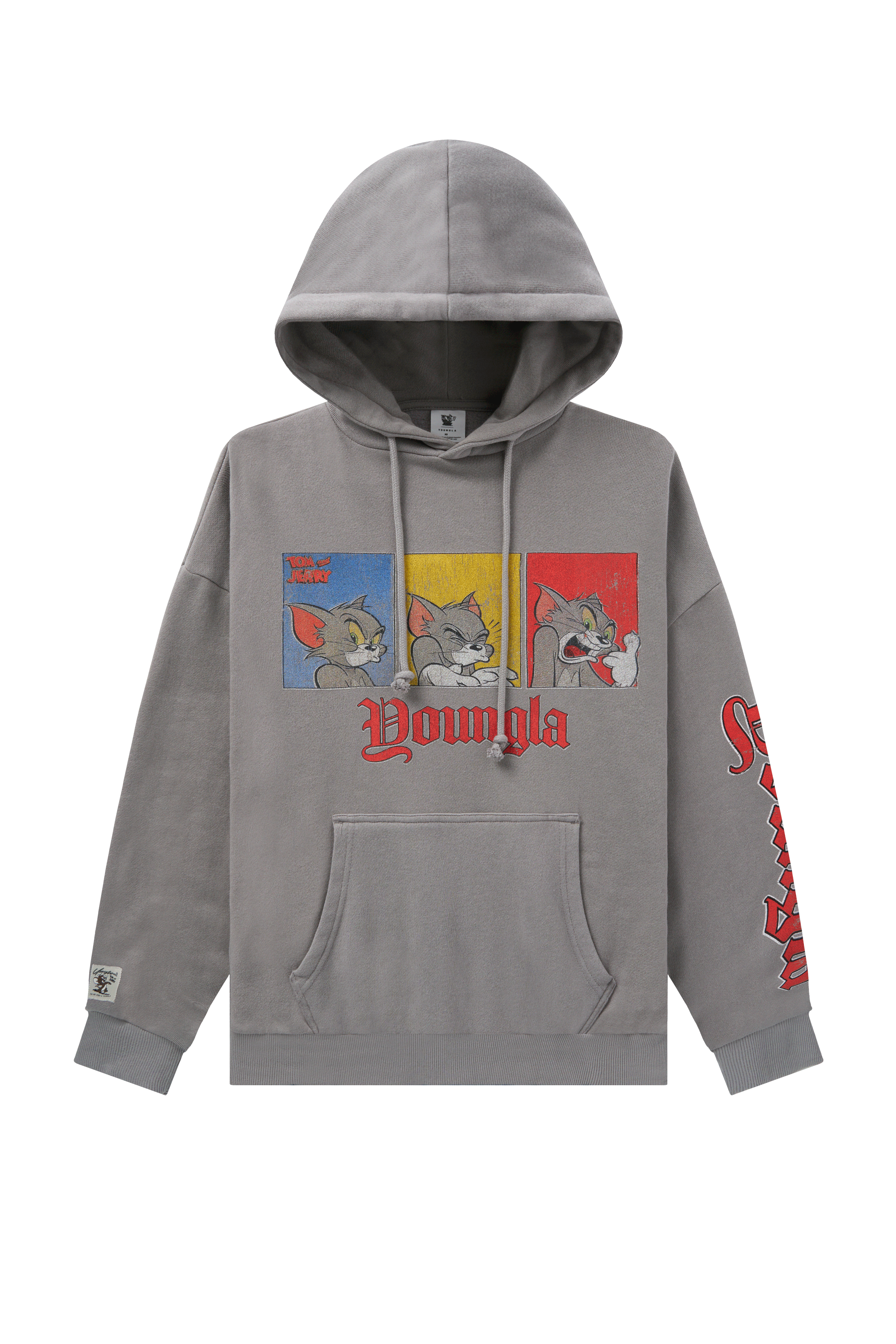 Model wearing an oversized zip-up hoodie with playful Tom & Jerry design, relaxed fit