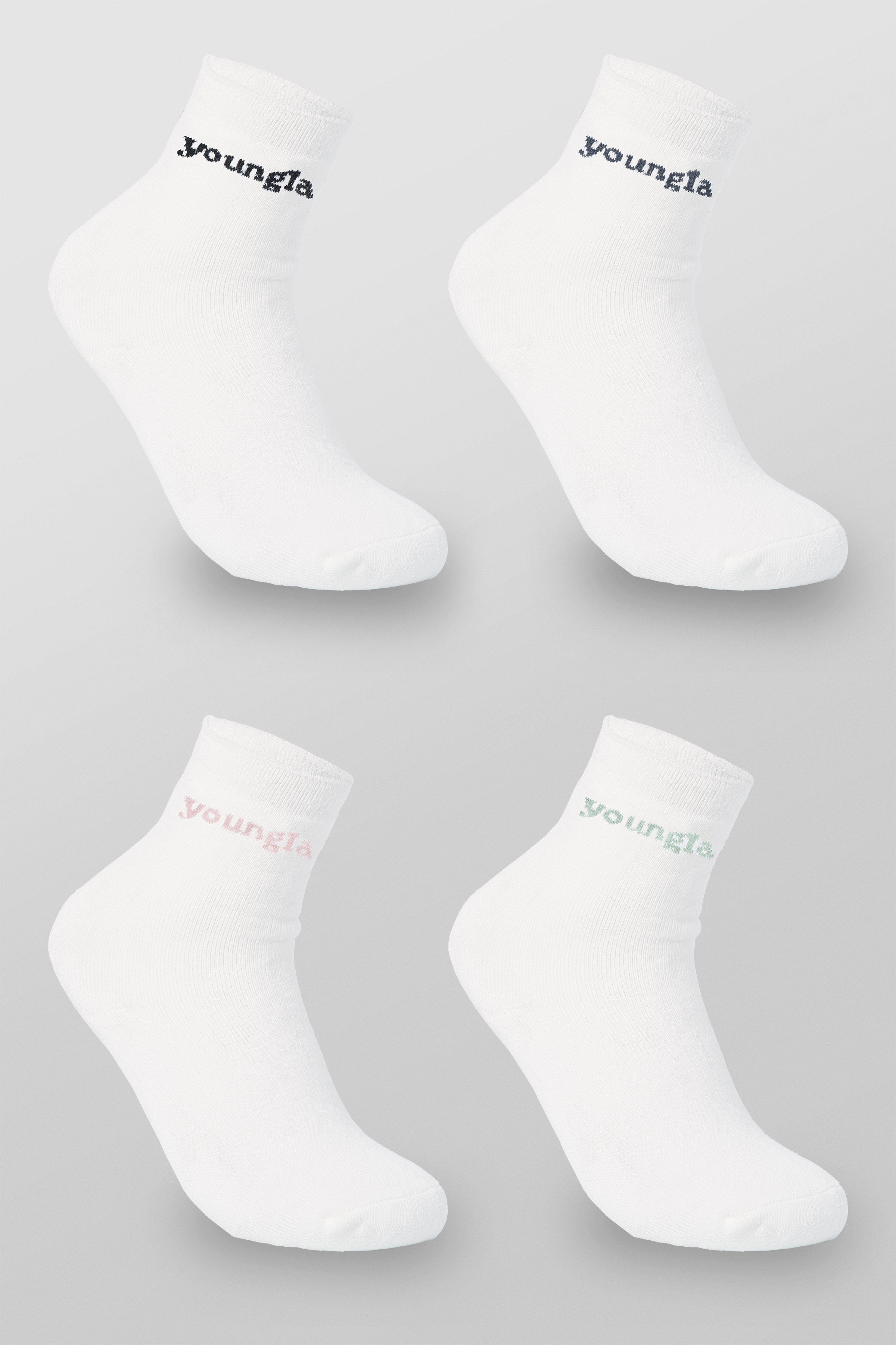 Balega Comfort Cloud Socks in pastel pink and cream, perfect for casual outings.