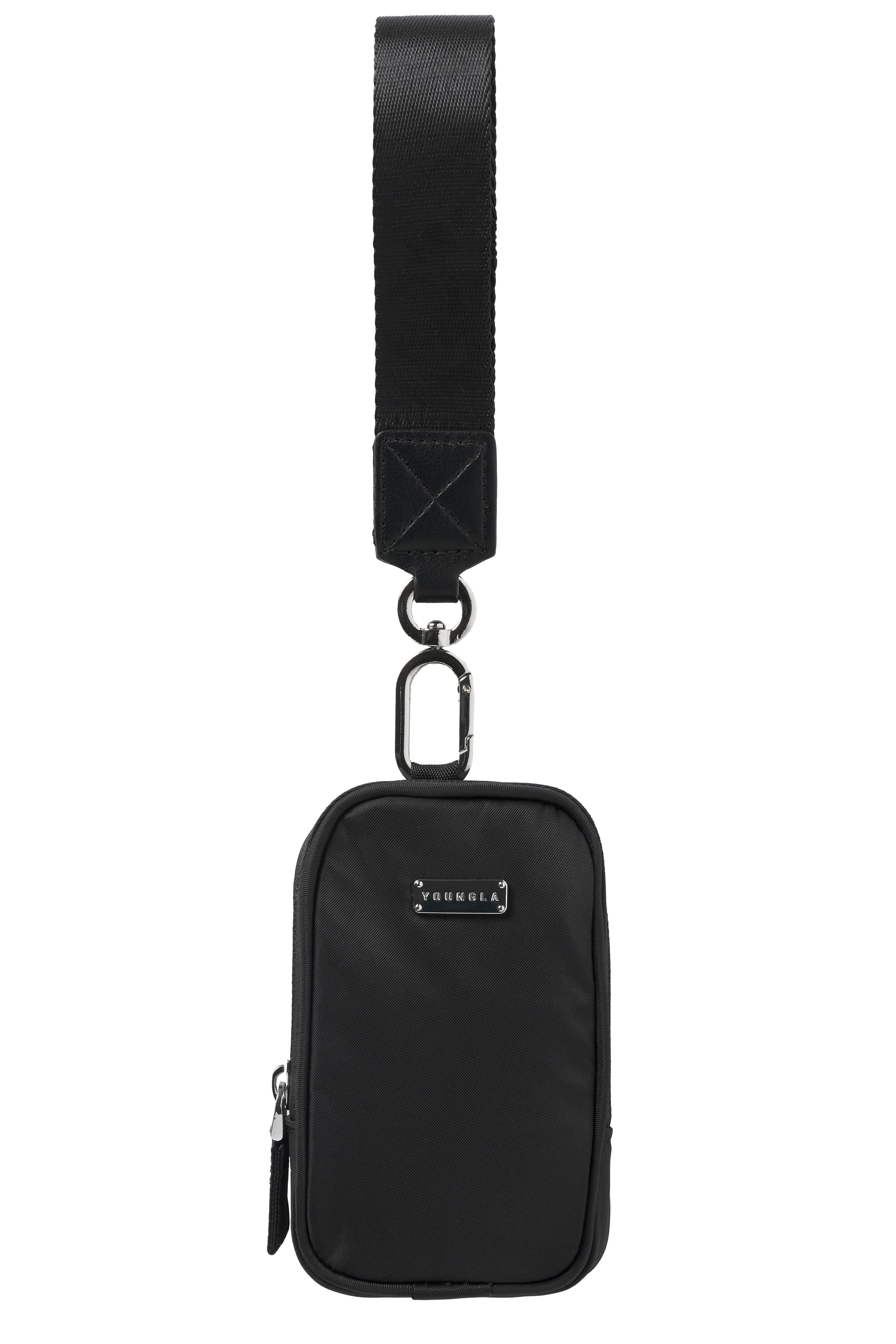 Open view of the mini pouch with keys and lip gloss inside