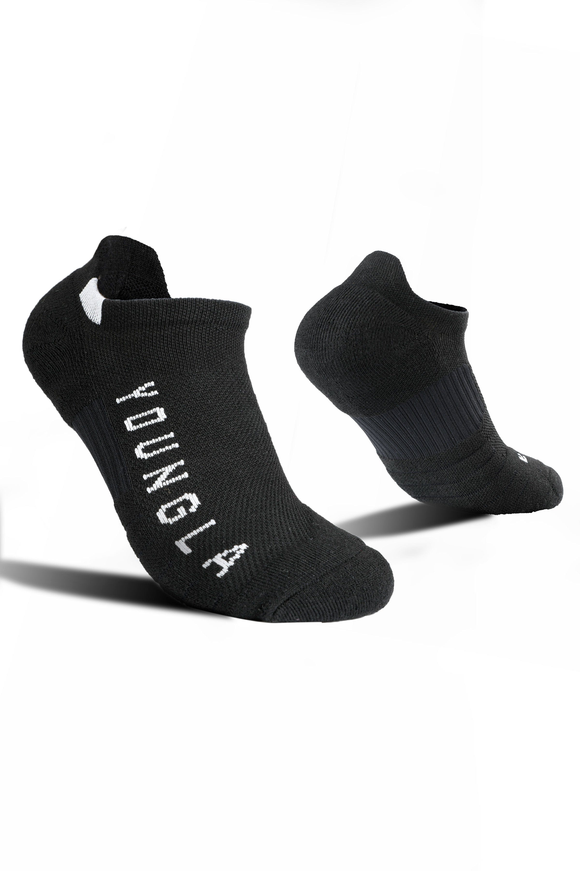 Side angle of fitted gym sock worn with running shoes