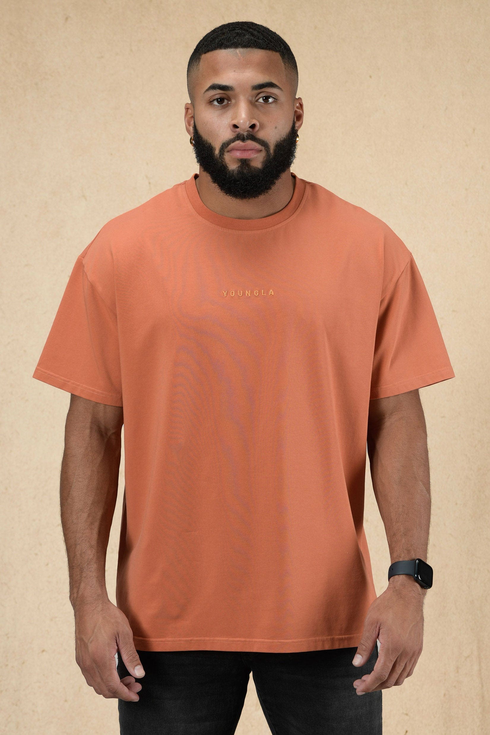 Front view of the essential oversized cropped tee in casual attire.