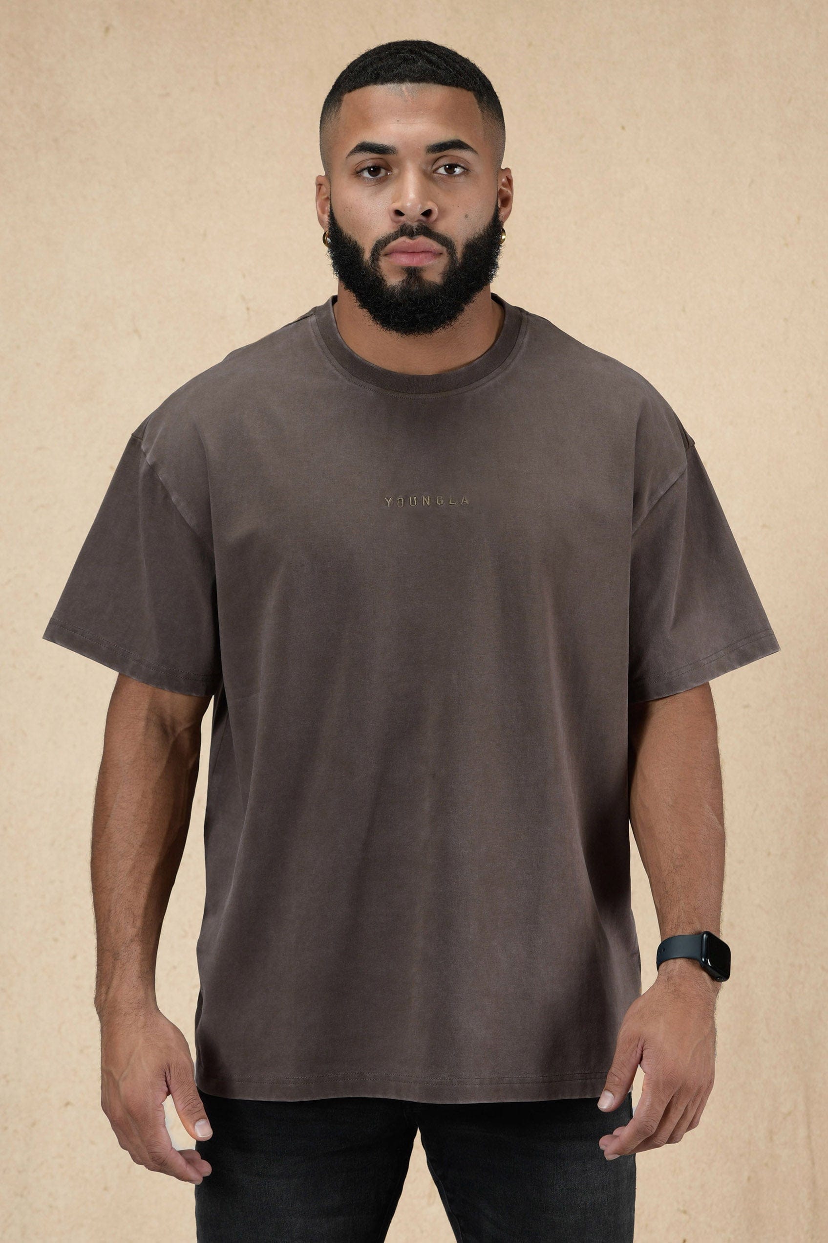 Front view of the essential oversized cropped tee in casual attire.