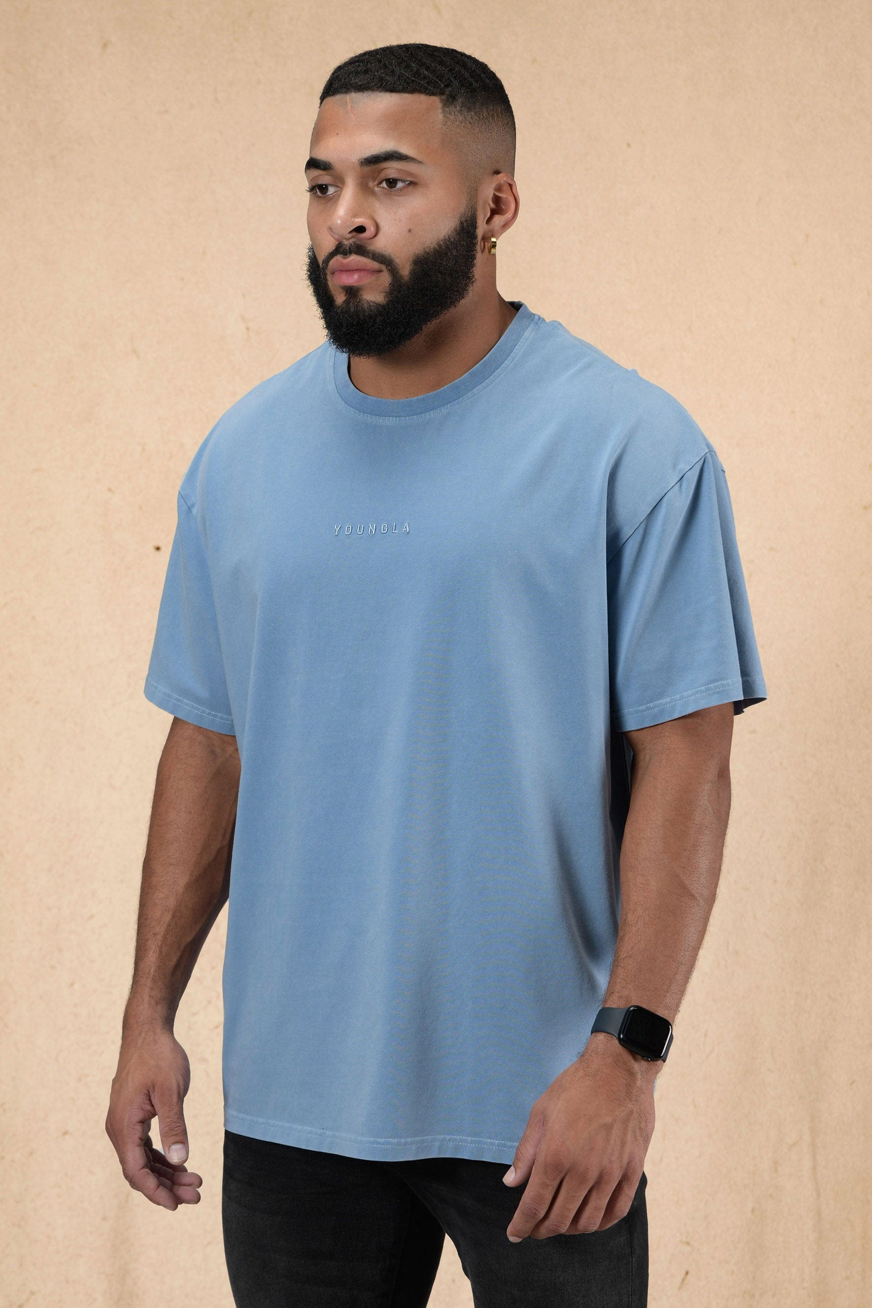 Model showcasing the oversized graphic tee women love for its comfort.