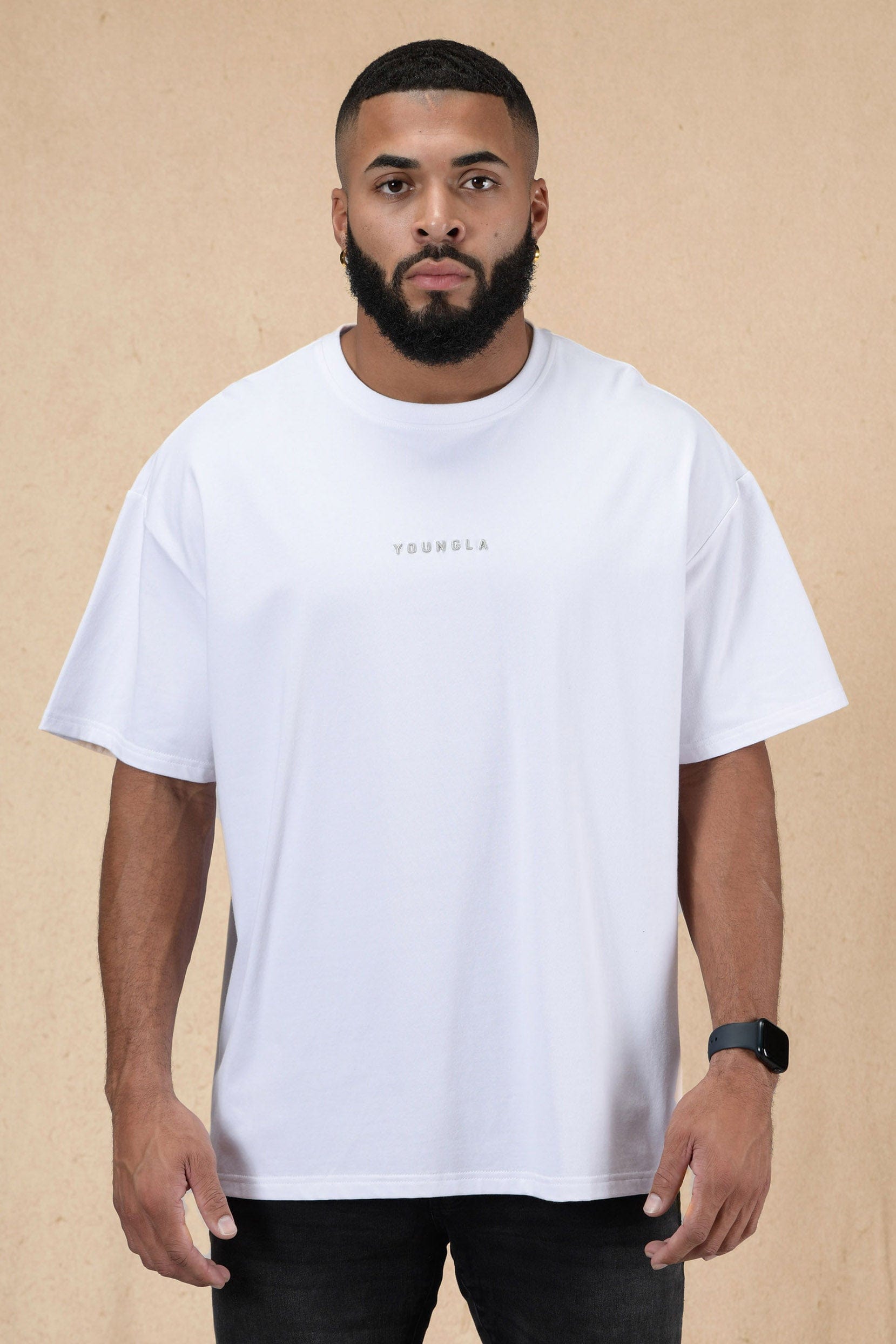 Front view of the essential oversized cropped tee in casual attire.