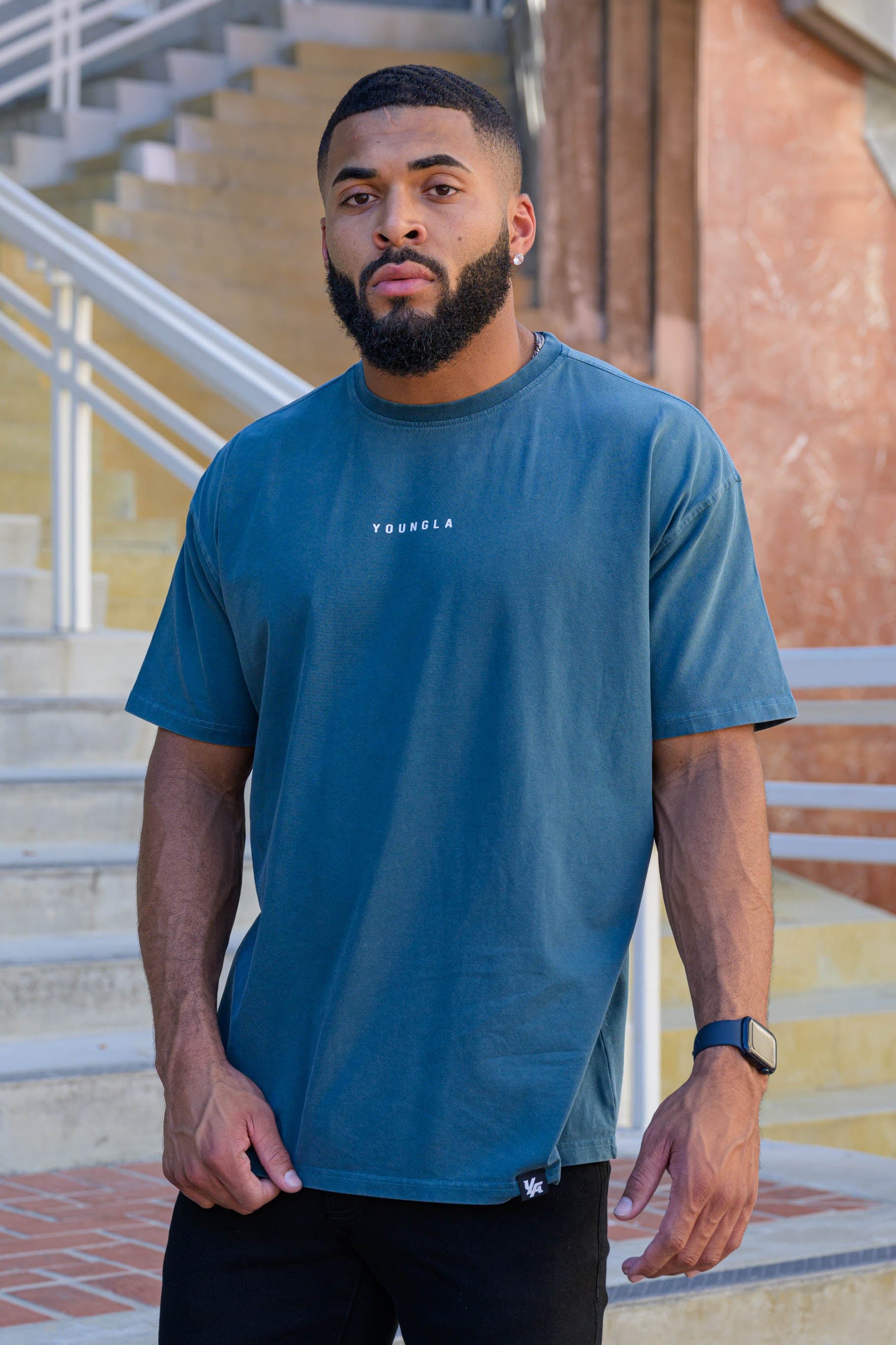 Front view of a relaxed fit cactus jack tee, highlighting the YoungLA logo.